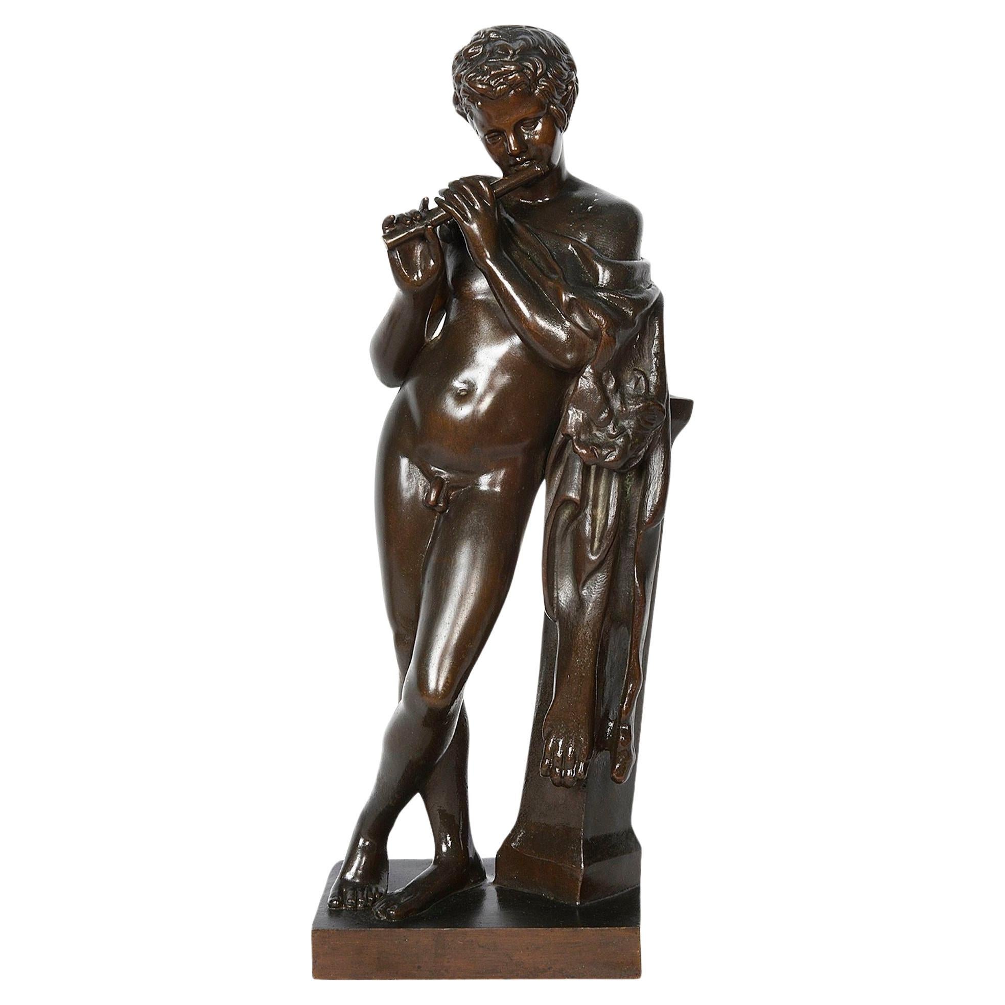 19th Century Bronze Faun playing a flute.