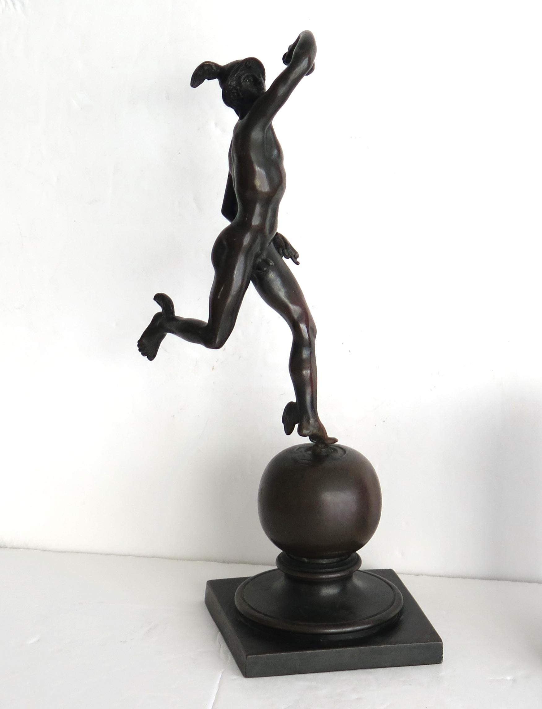 This is a solid bronze figurine sculpture of Hermes or Mercury from Greek and Roman mythology respectively, and we date the figure to the 19th century, probably by a French or Austrian maker.

The bronze figure is well sculpted in good clear