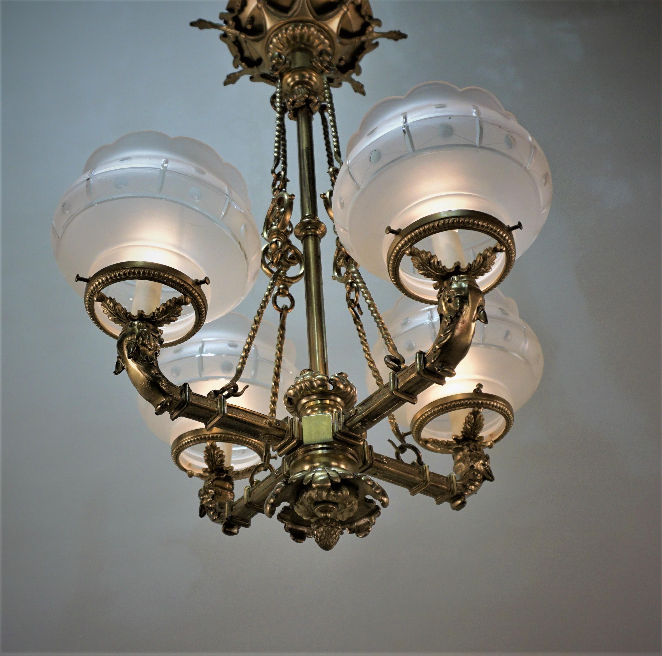 19th century beautiful heavy cast bronze four light gas chandelier with cut glass shades.