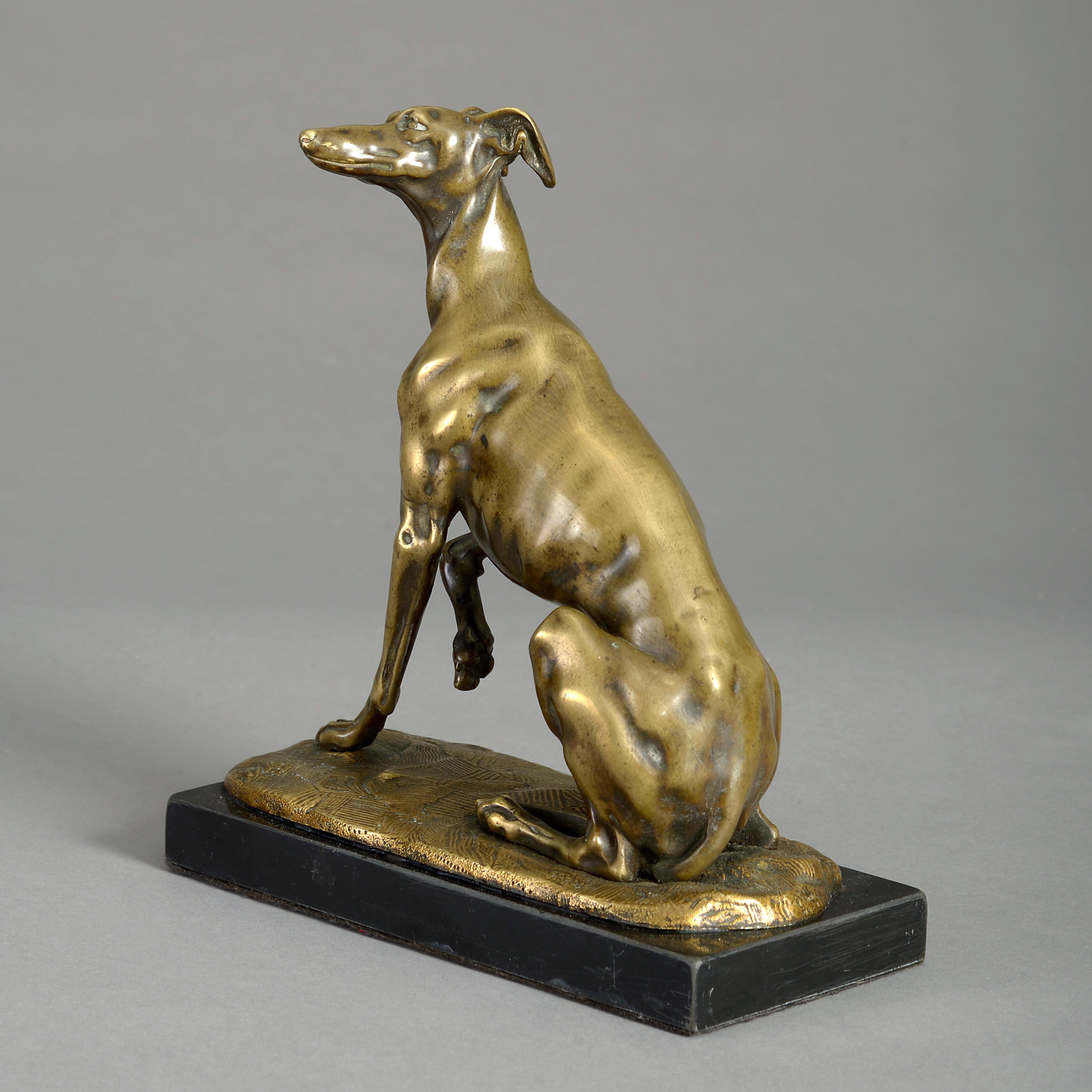 An early 19th century Empire period finely cast bronze greyhound, of good color, modelled seated and set upon a black marble plinth.
 
  