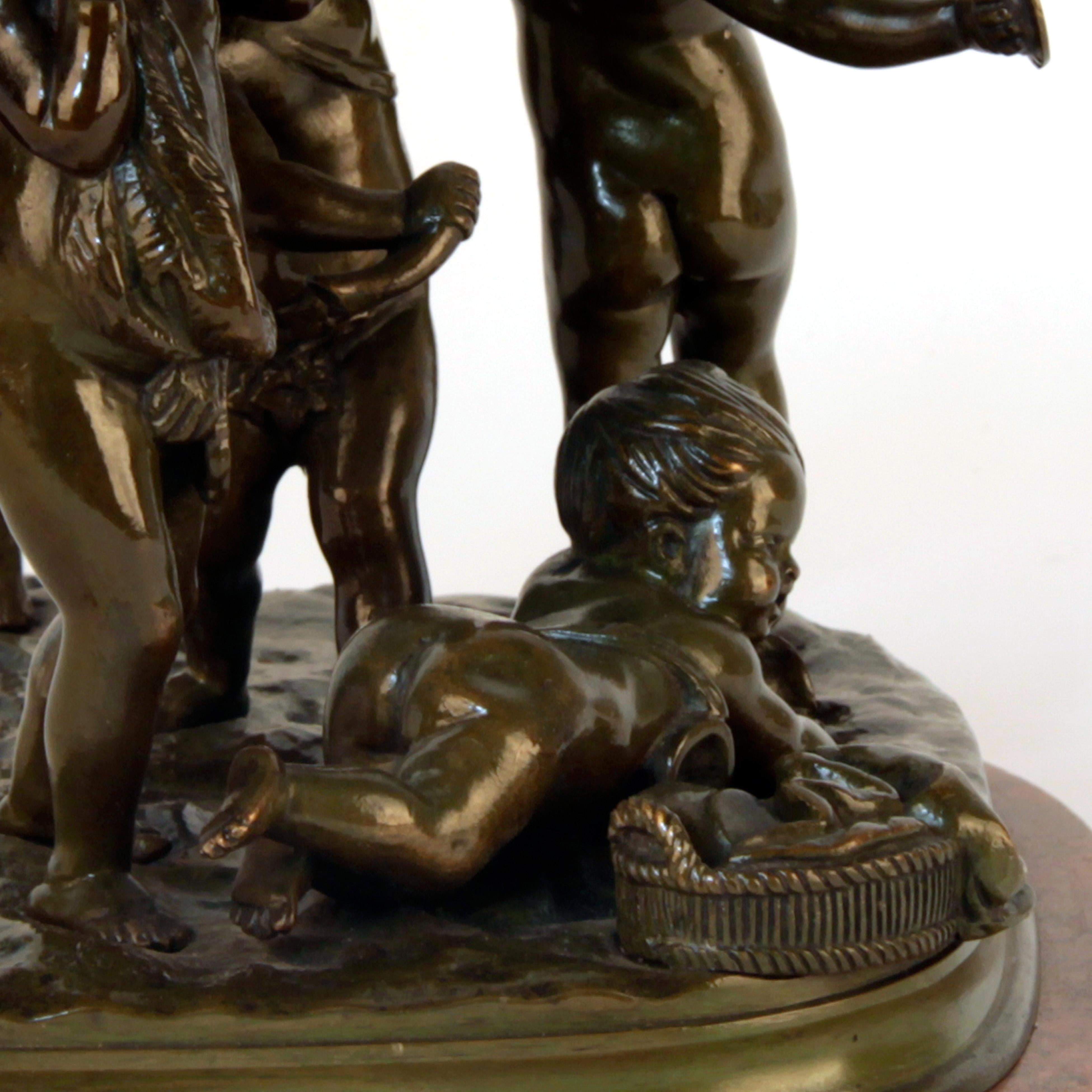 Groupe de puttis en bronze du 19ème siècle sur socle en marbre, signé par Clodion en vente 1