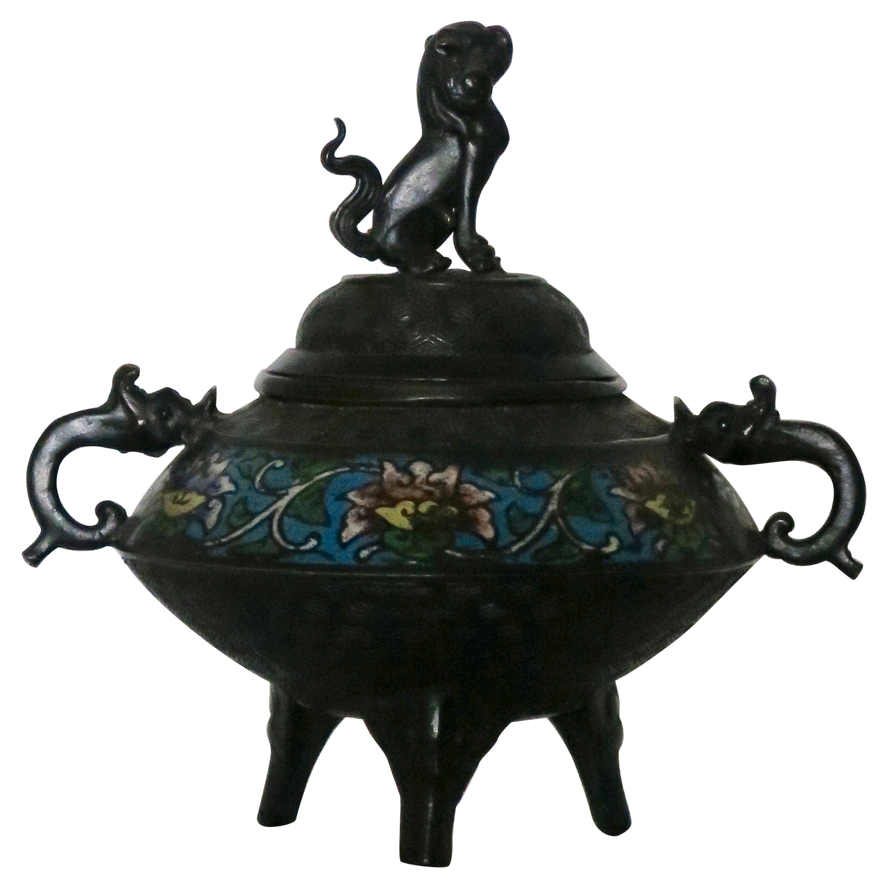 Bronze censer.
Period: Late 19th century.
Very good quality finish.
Nice enameled decor colors and beautiful age patina.
Dimensions: Diameter 15 cm and 20 cm with the handles decor x height 20 cm.