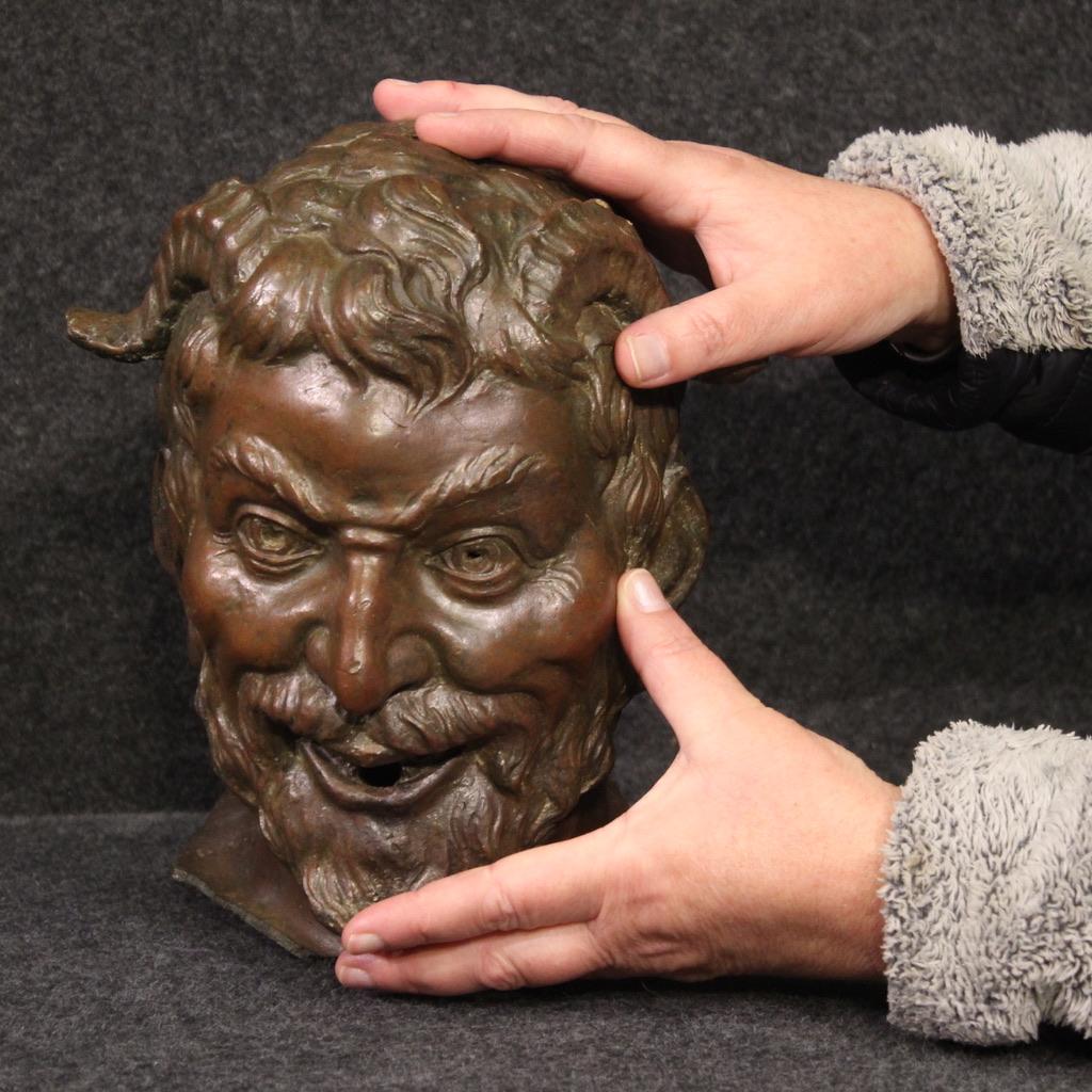 Italian bronze sculpture from the second half of the 19th century. Work finished from the centre, finely chiselled and patinated, depicting the head of a faun. Sculpture with a hole in the mouth of the God Pan (see photo), an ornamental object