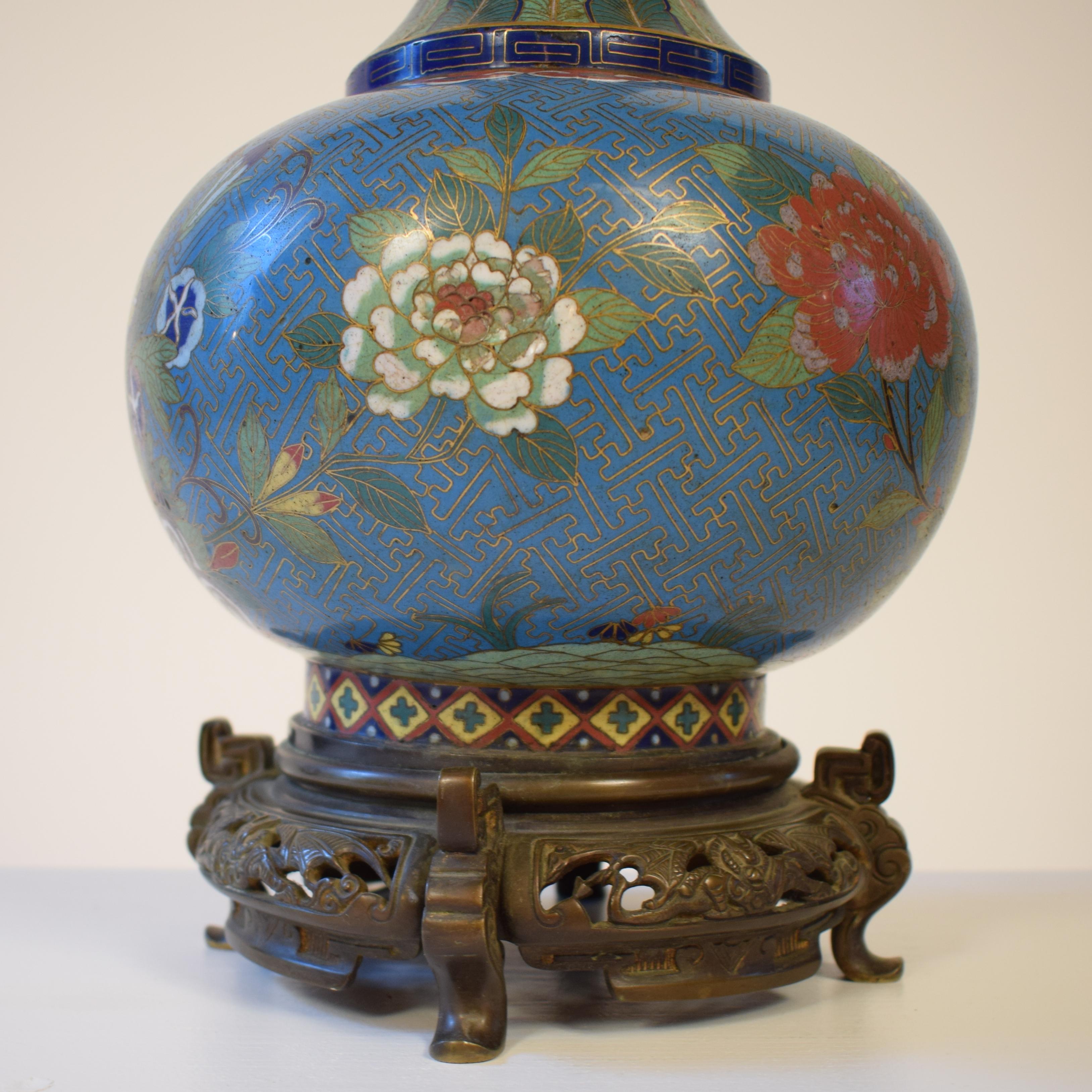 This elegant 19th century bronze-mounted Chinese table lamp was produced, circa 1880.
The beautiful hand painted enamel coated metal vase with the deep blue color and the great details makes this lamp very special.