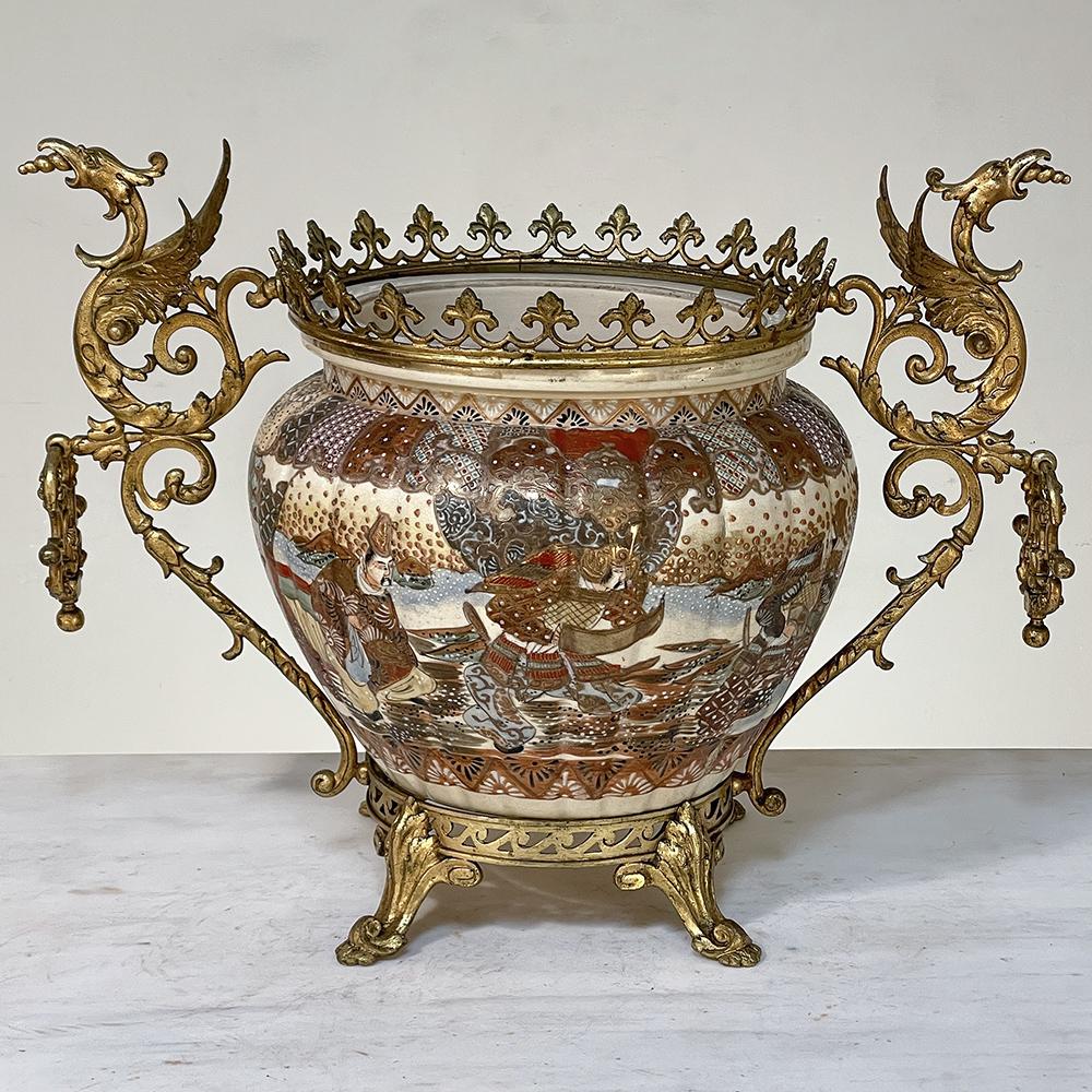 19th Century bronze mounted satsuma jardiniere is a splendidly preserved artifact from a wonderful period in French history! The porcelain bowls were meticulously hand-painted in what is today called Satsuma pattern, which was made in and around