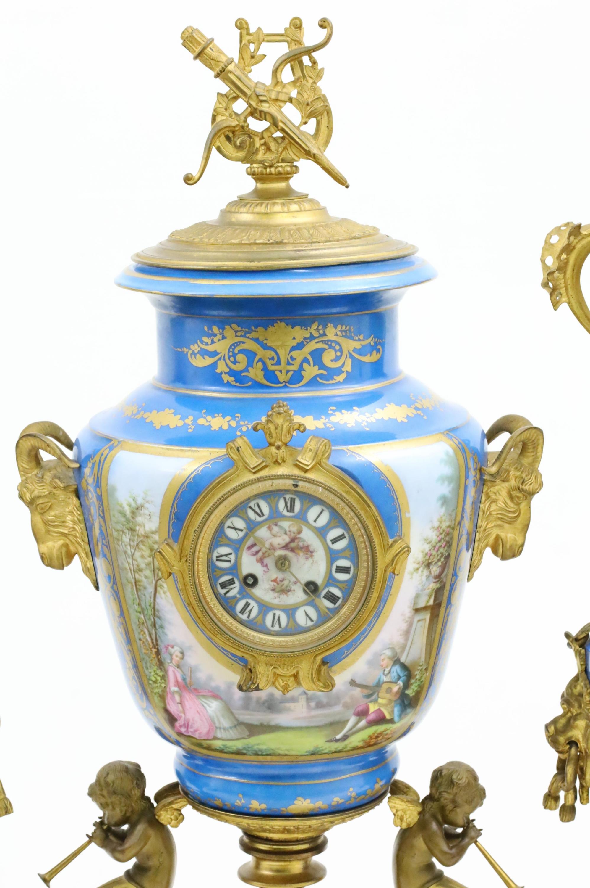 Impressive three piece gilt bronze mounted Sevres robin egg porcelain clock set, center clock urn having amorial bow and quiver finial and rams head handles, body with hand painted courting scene reserves surrounding bronze clock bezel, the enameled