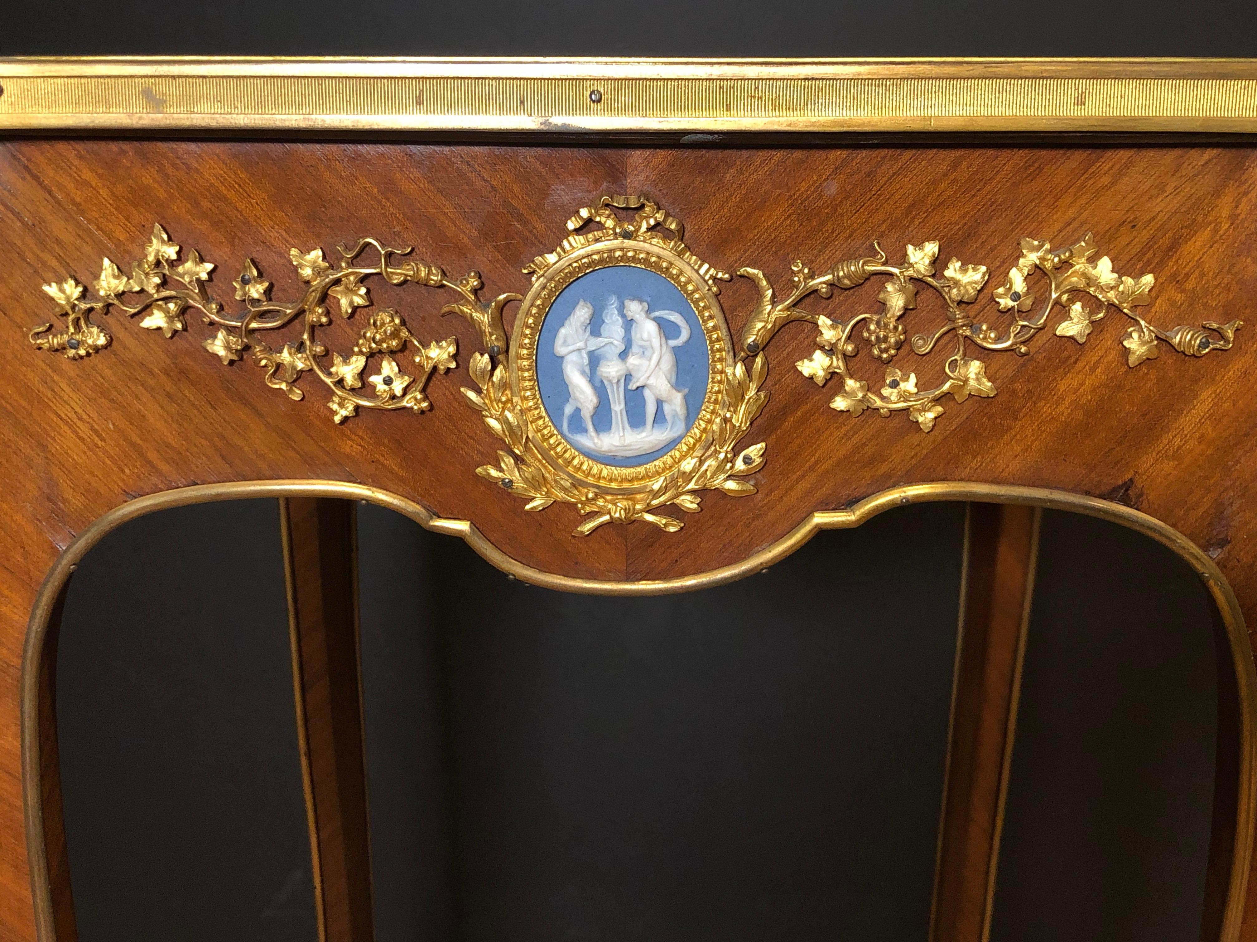 19th century doré bronze mounted parquetry side table. Finest quality. Side medallions of blue and white Wedgewood.