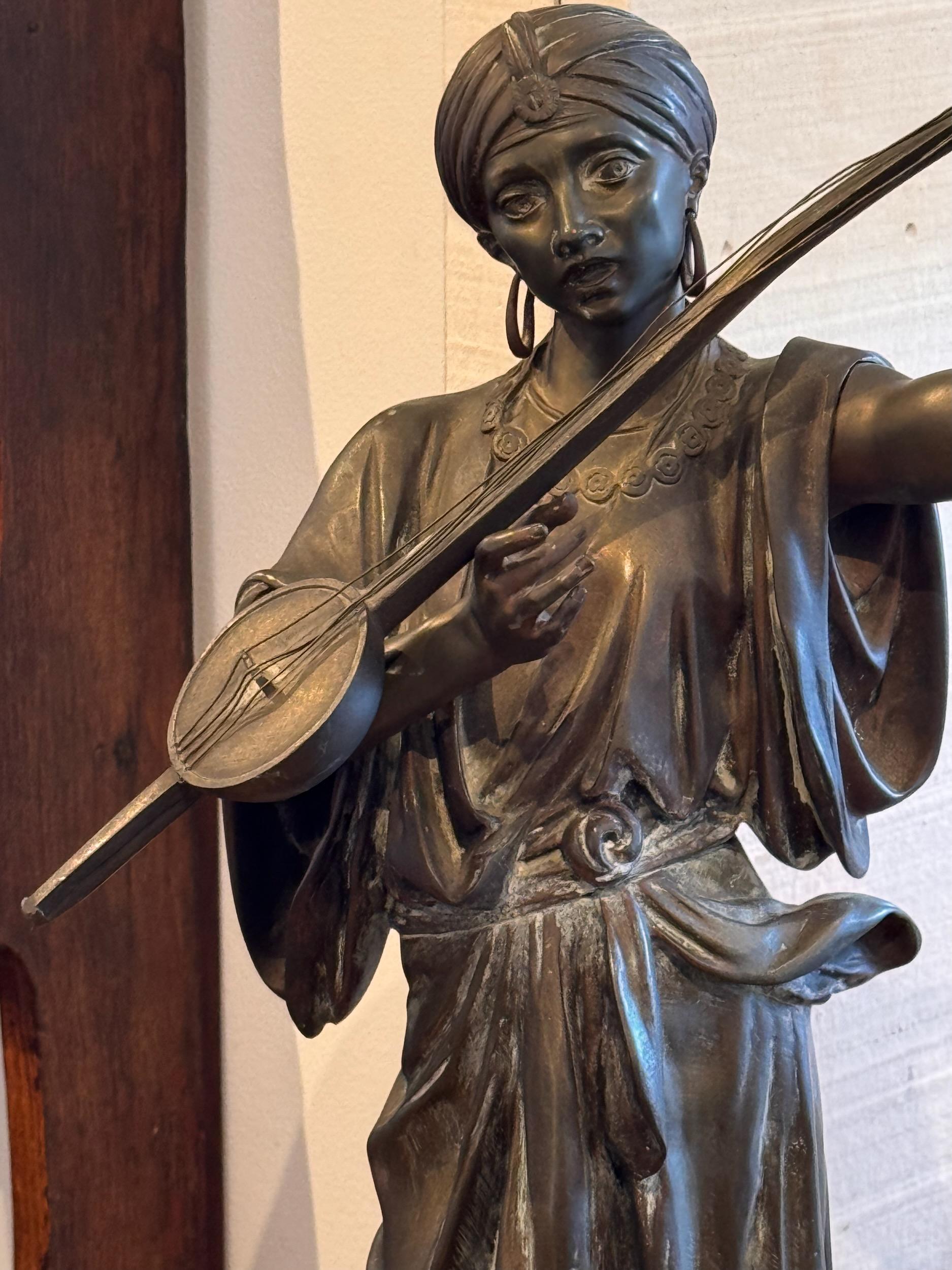 Bronzo Scultura in bronzo del XIX secolo di un musicista in vendita