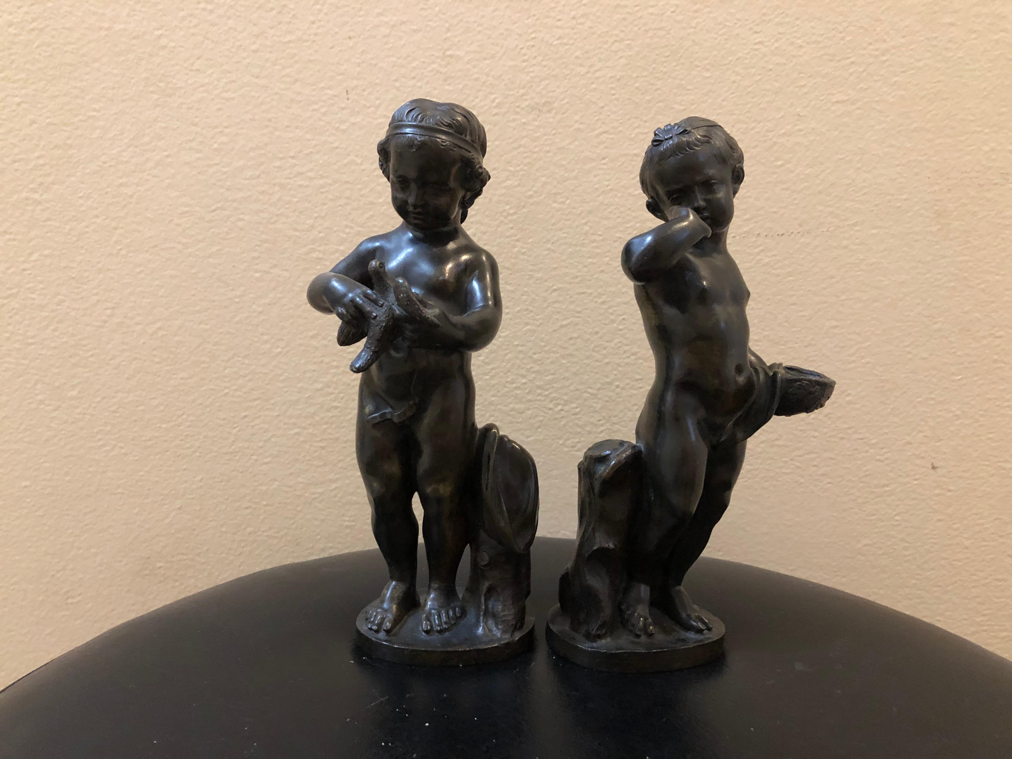 Beautiful pair of 19th century bronze putti's. They each measure 8 inches high by 3 inches wide. Incredible detail in these two beauties.