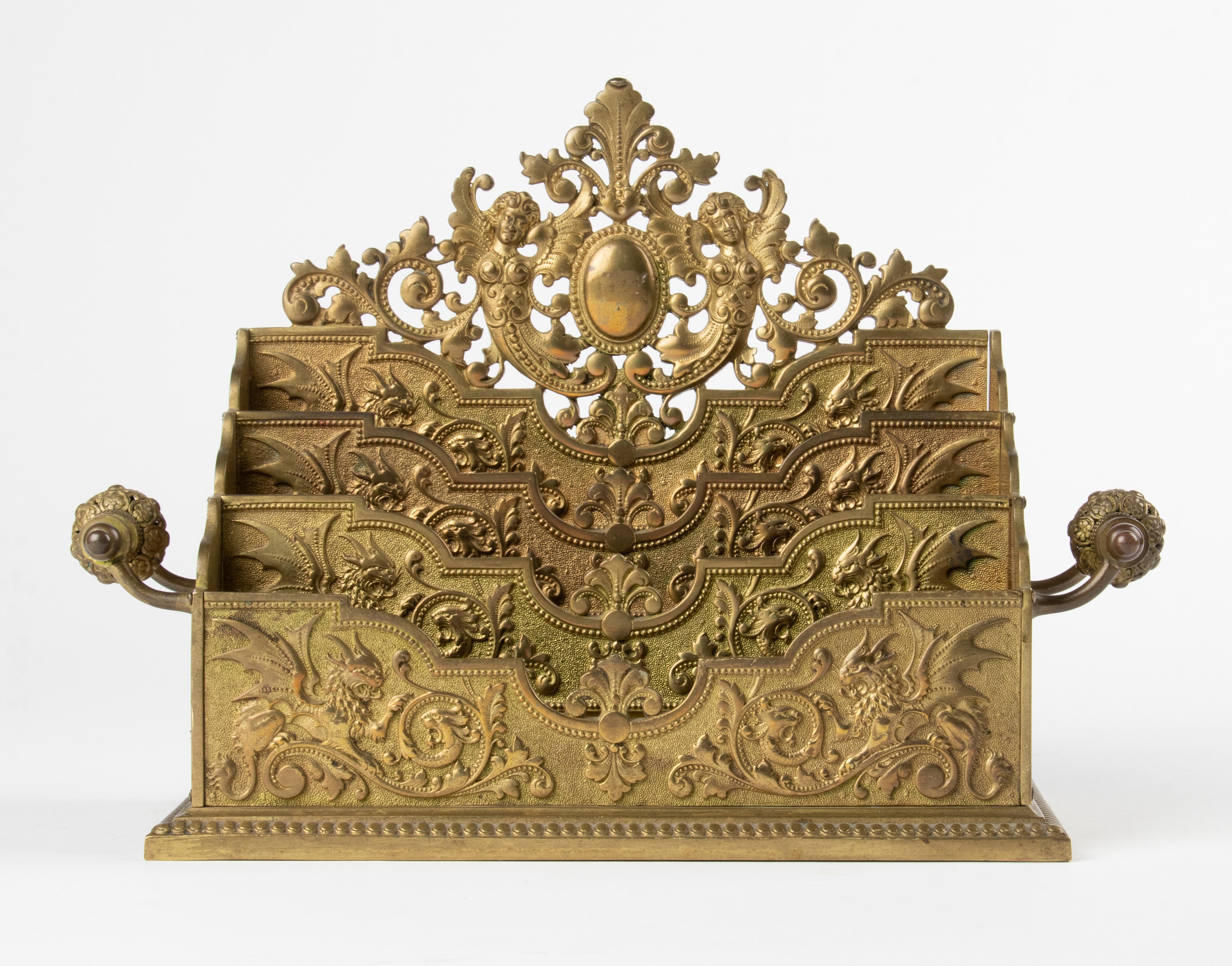 Late 19th century French bronze letter rack, richly decorated with ornaments and griffins in Renaissance style. Heavy quality bronze as well as very refined. Dating from about 1880.