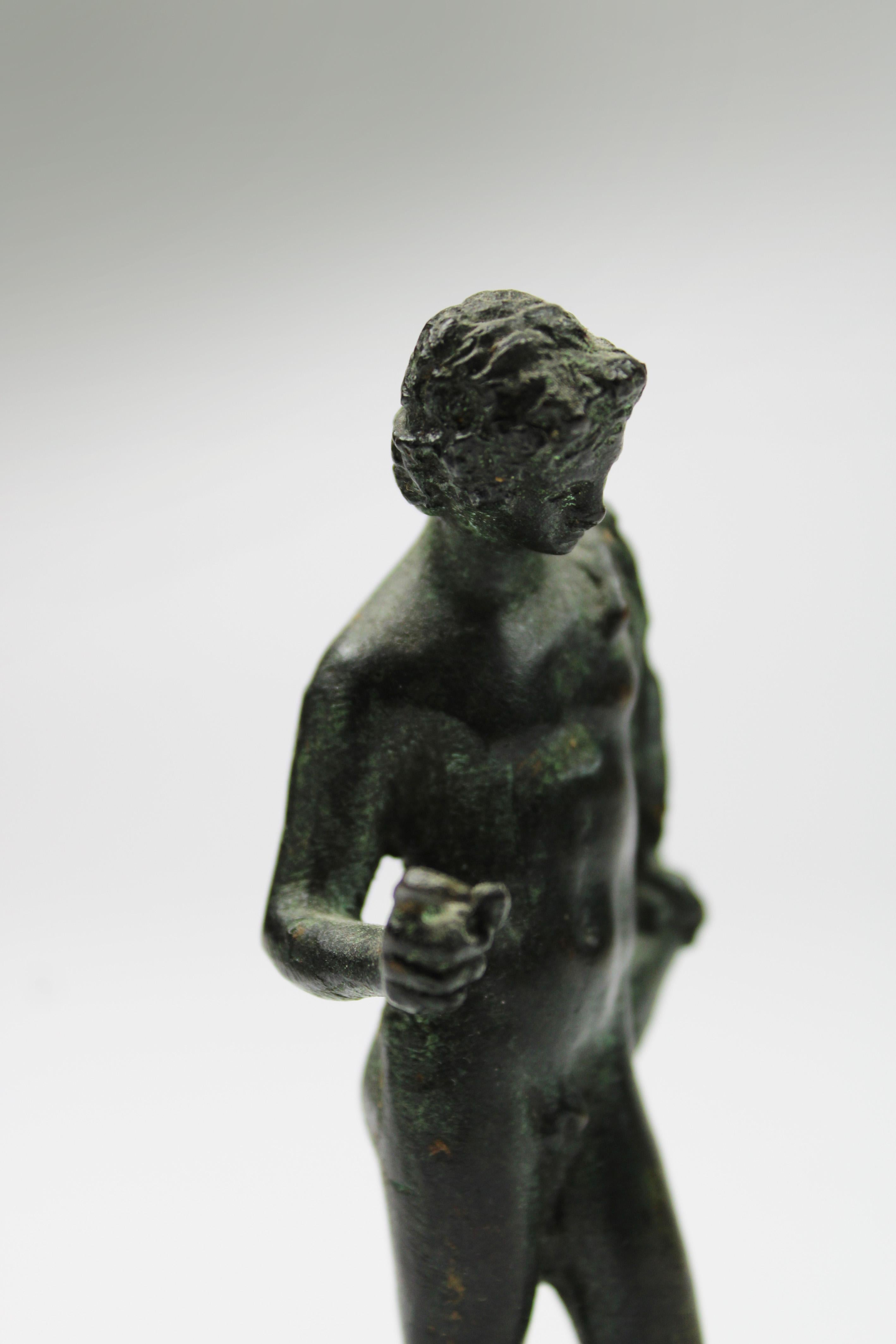 This captivating 19th-century bronze sculpture of Narcissus is a remarkable Grand Tour souvenir, inspired by the ancient find in Pompeii, Italy, excavated in 1862. The sculpture depicts the mythological figure Narcissus, known for his beauty and