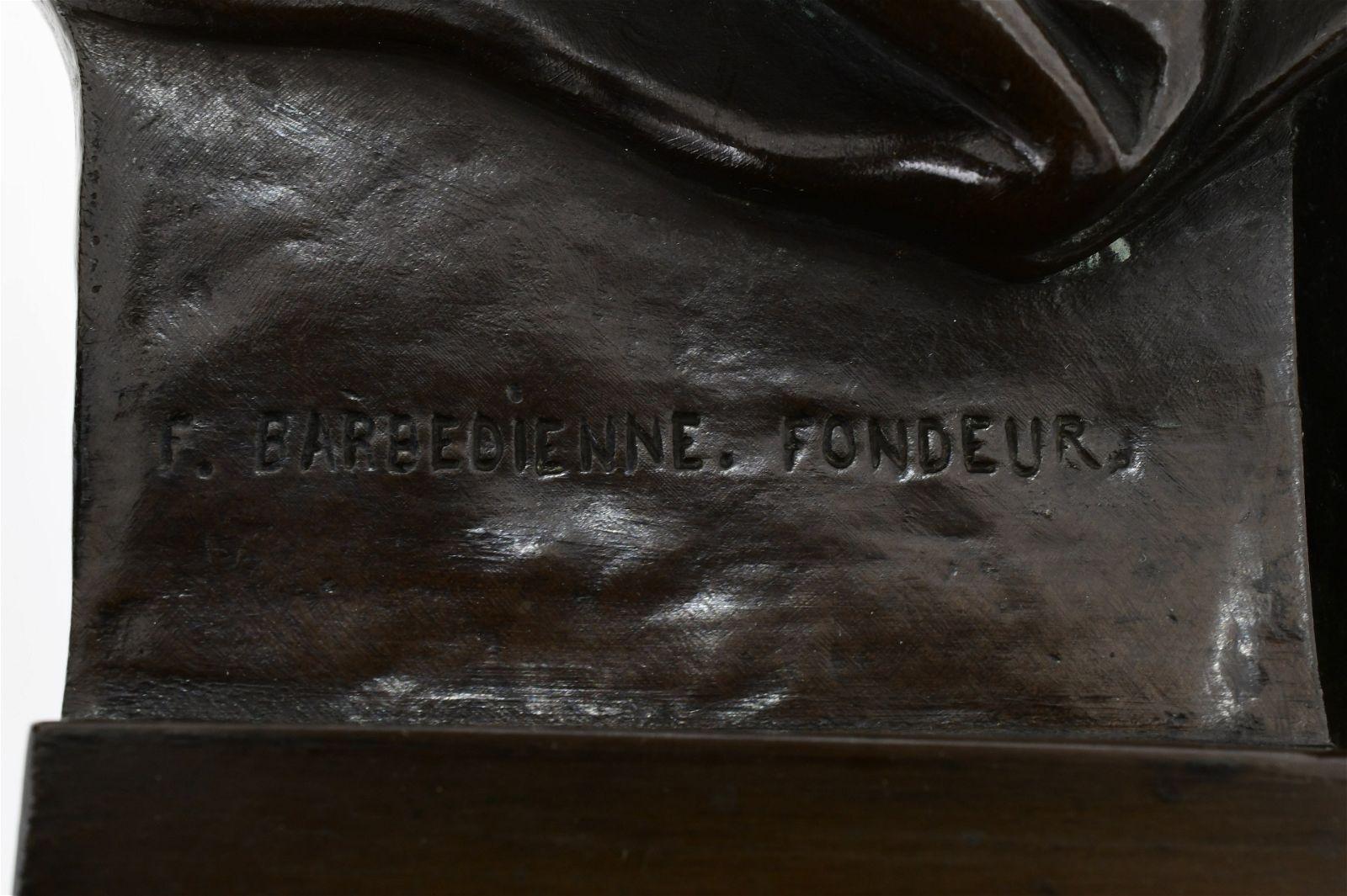 Antique figure of seated Moses after the original by Michelangelo, cast by Barbedienne, measuring 17 1/2 inches tall.  With the stamped mark of the foundry and signed F Barbedienne Fondeur.
