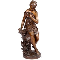 19th Century Bronze Statue of a Young Girl Holding a Bird