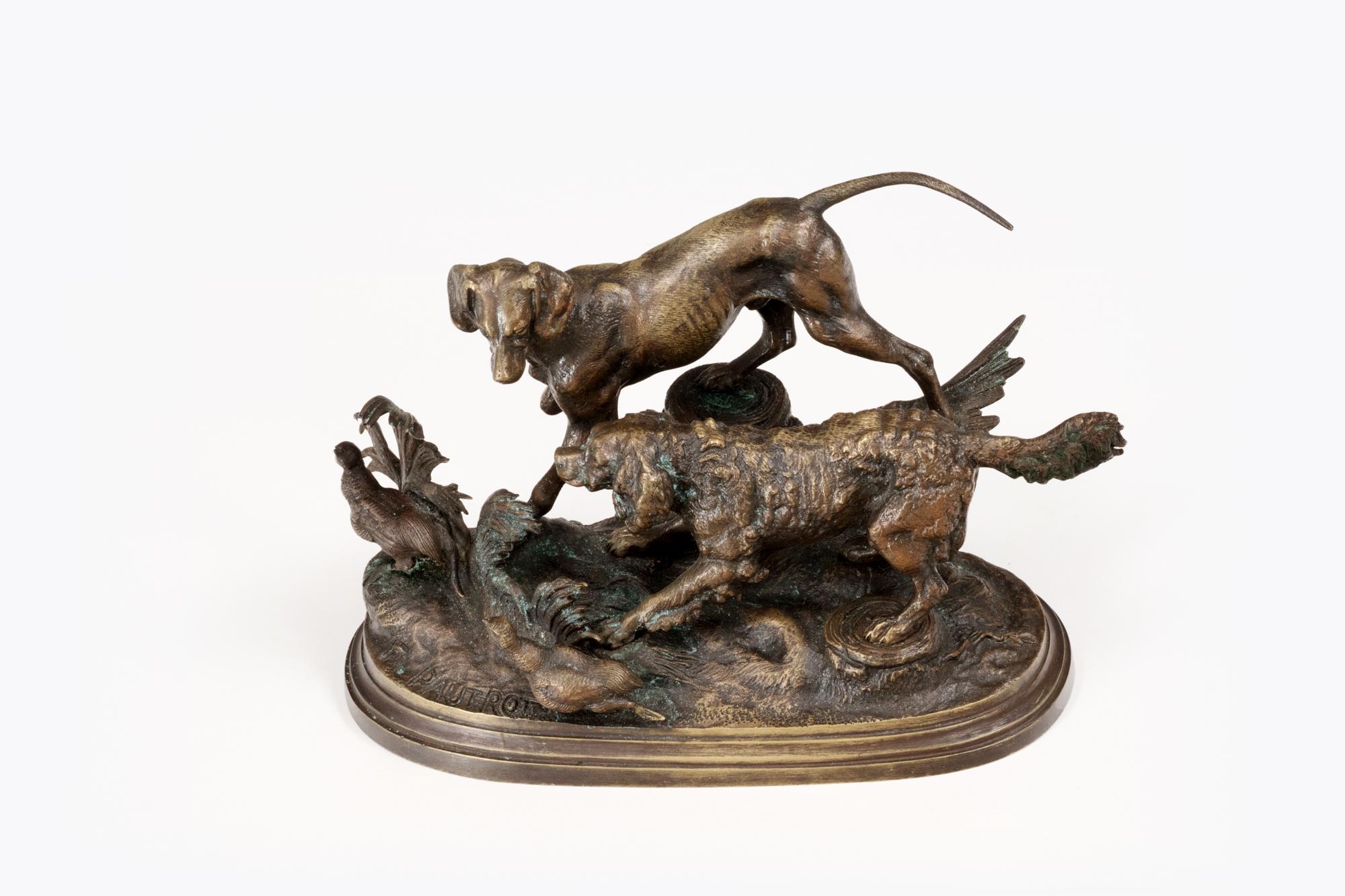 19th Century bronze statue of a pointer and spaniel hunting grouse with signature of F. Pautrot.

Ferdinand Pautrot’s (French, 1832-1874) first recorded exhibit was at the Salon in Paris in 1861 with three entries. He continued to exhibit at the
