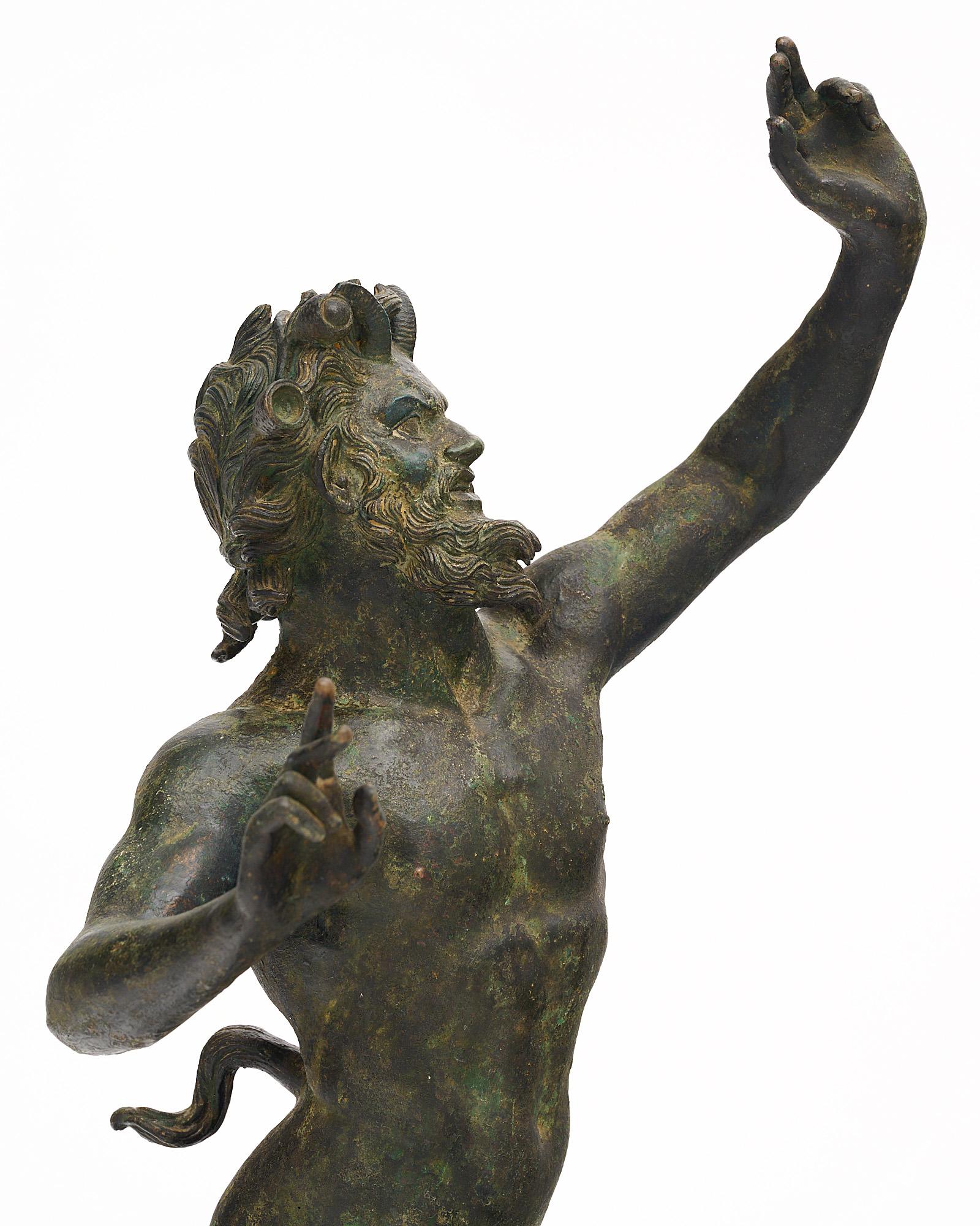 19th Century bronze statue depicting a faun signed “Chiurazzi Napoli” from the Chiurazzi foundry. Raised on a base of 10” by 11.25”, the figure shows a man with horns and tail. This piece has wonderful intricate detail. 
 
Chiurazzi foundries were