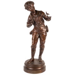 Statue en bronze du 19e siècle représentant un jeune garçon, intitulée « Lesson in Song » par E Carlier