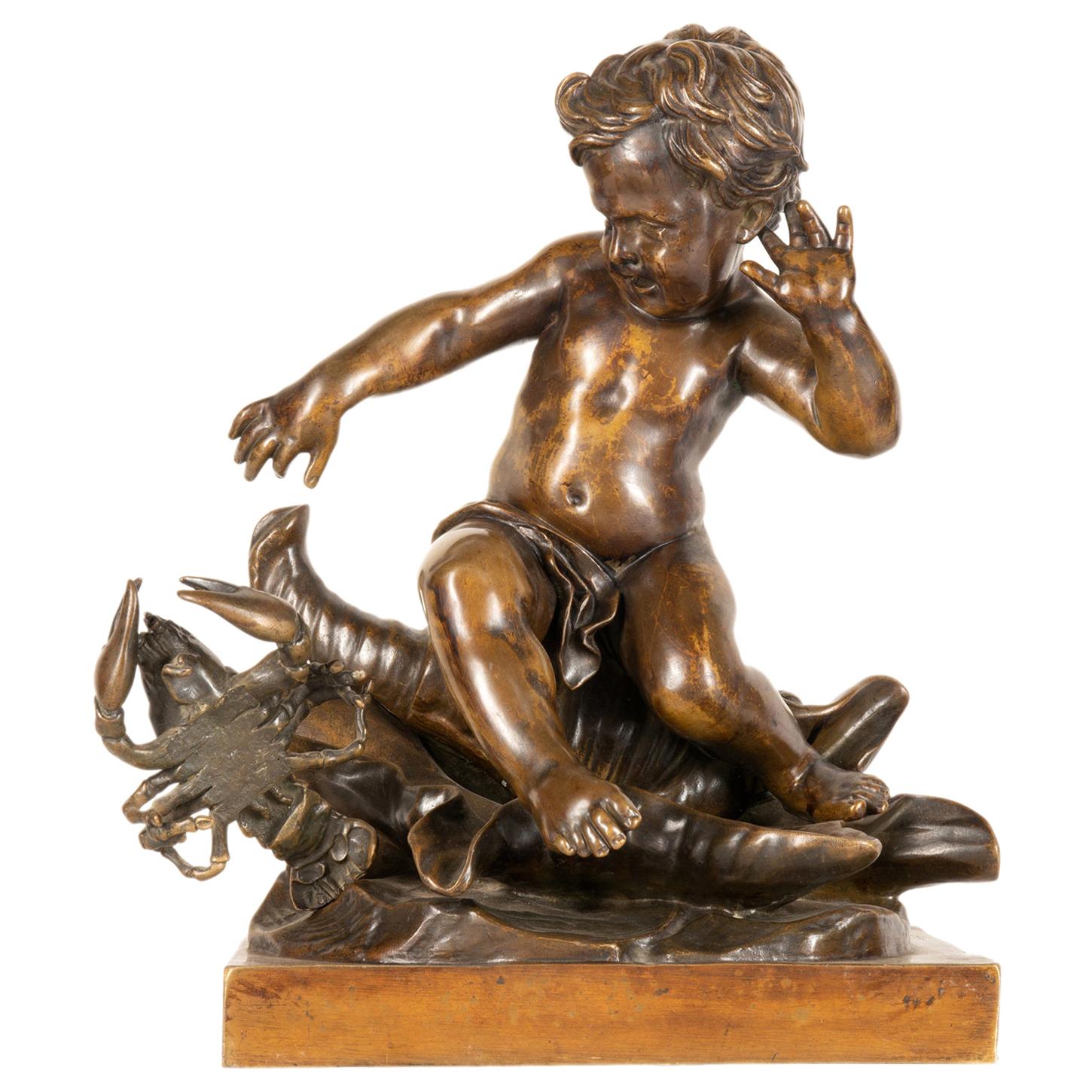 Étude en bronze du 19e siècle représentant un enfant assis sur un coquillage, signée Pigale