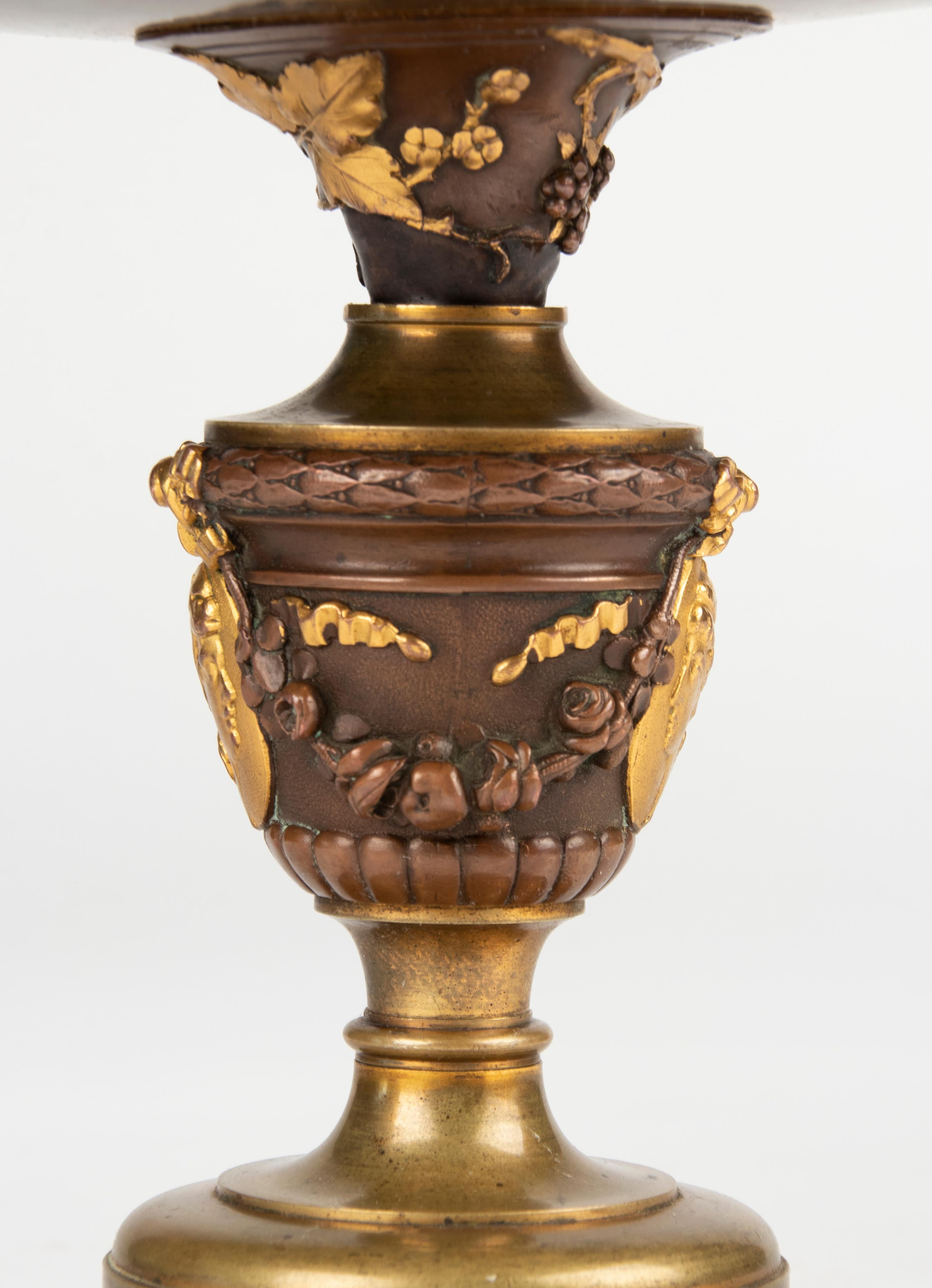 Beautiful antique bronze tazza, a bowl on a high foot. The bowl is decorated with graceful flowers and dates from the late 19th century. Multicolored patina.
The bowl is signed Oudry, a well-known French designer of bronze statues and ornamental