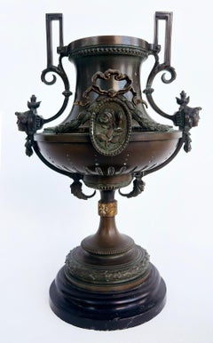 19th-Century Bronze Urns with Gilt Cartouches on Stone Bases, Pair