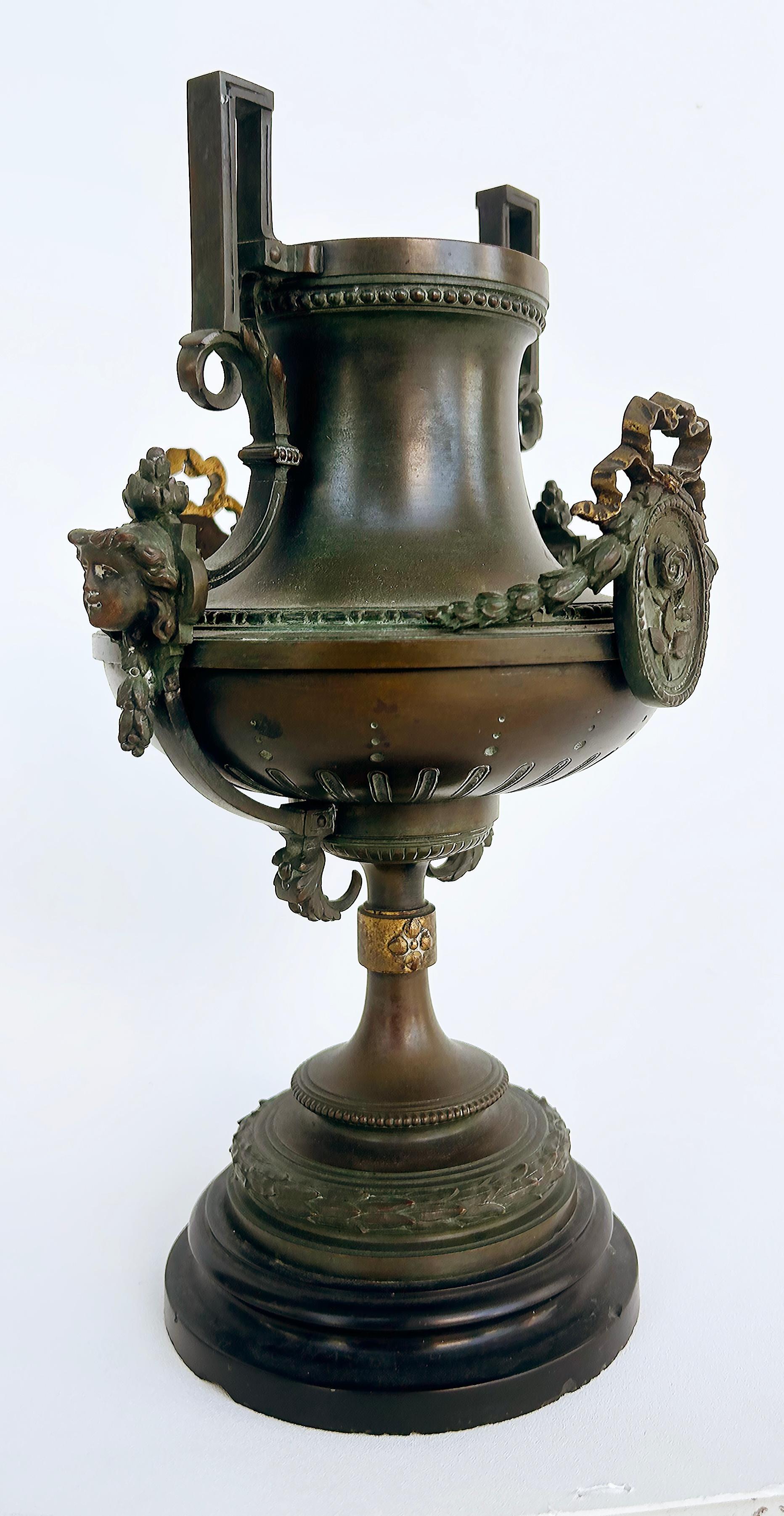 19th-Century Bronze Urns with Gilt Cartouches on Stone Bases, Pair In Good Condition For Sale In Miami, FL