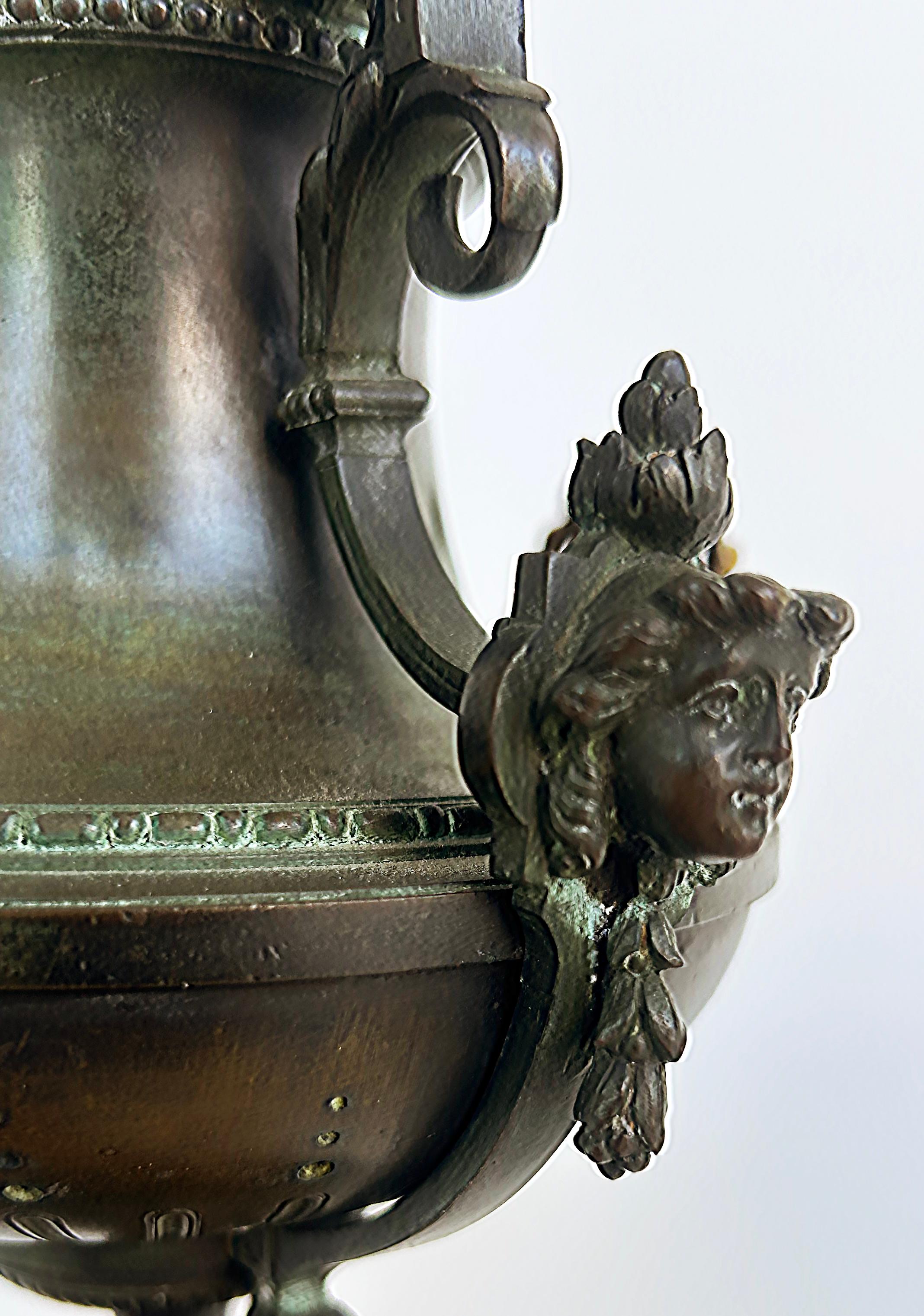 19th-Century Bronze Urns with Gilt Cartouches on Stone Bases, Pair For Sale 2