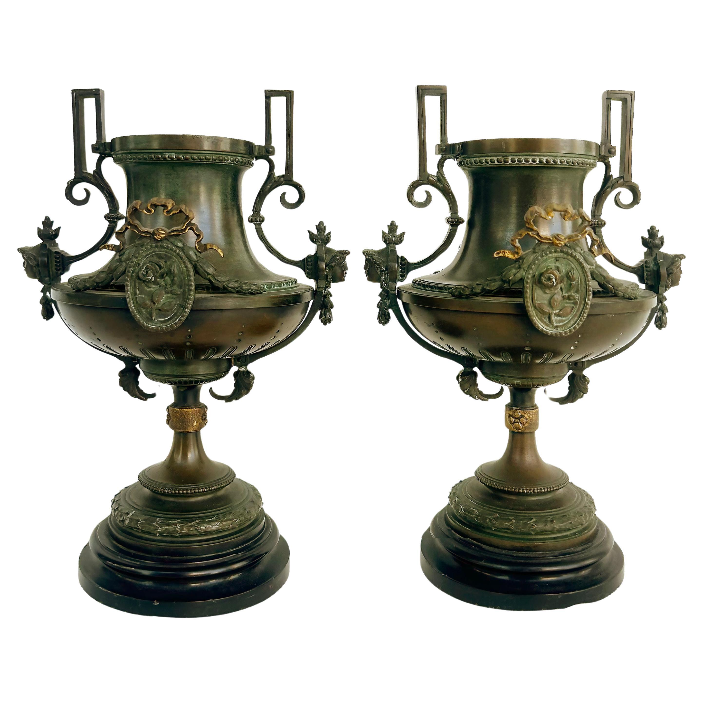 19th-Century Bronze Urns with Gilt Cartouches on Stone Bases, Pair For Sale