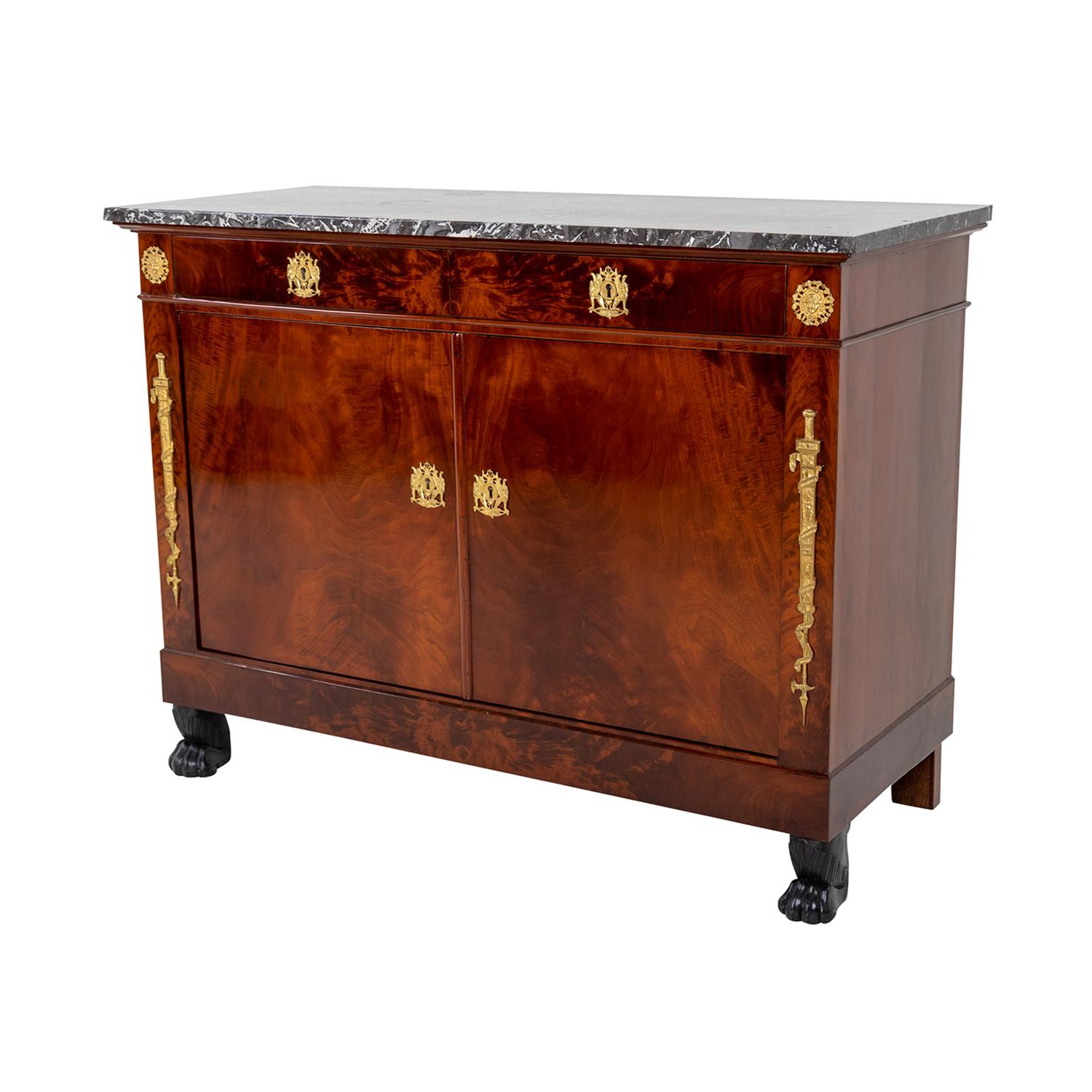 A dark-brown, antique French single chest of drawers made of hand crafted shellac polished Mahogany, veneered on Oakwood in good condition. The rectangular cupboard is composed with a grey-white marble top, the inside is consisting one shelf,