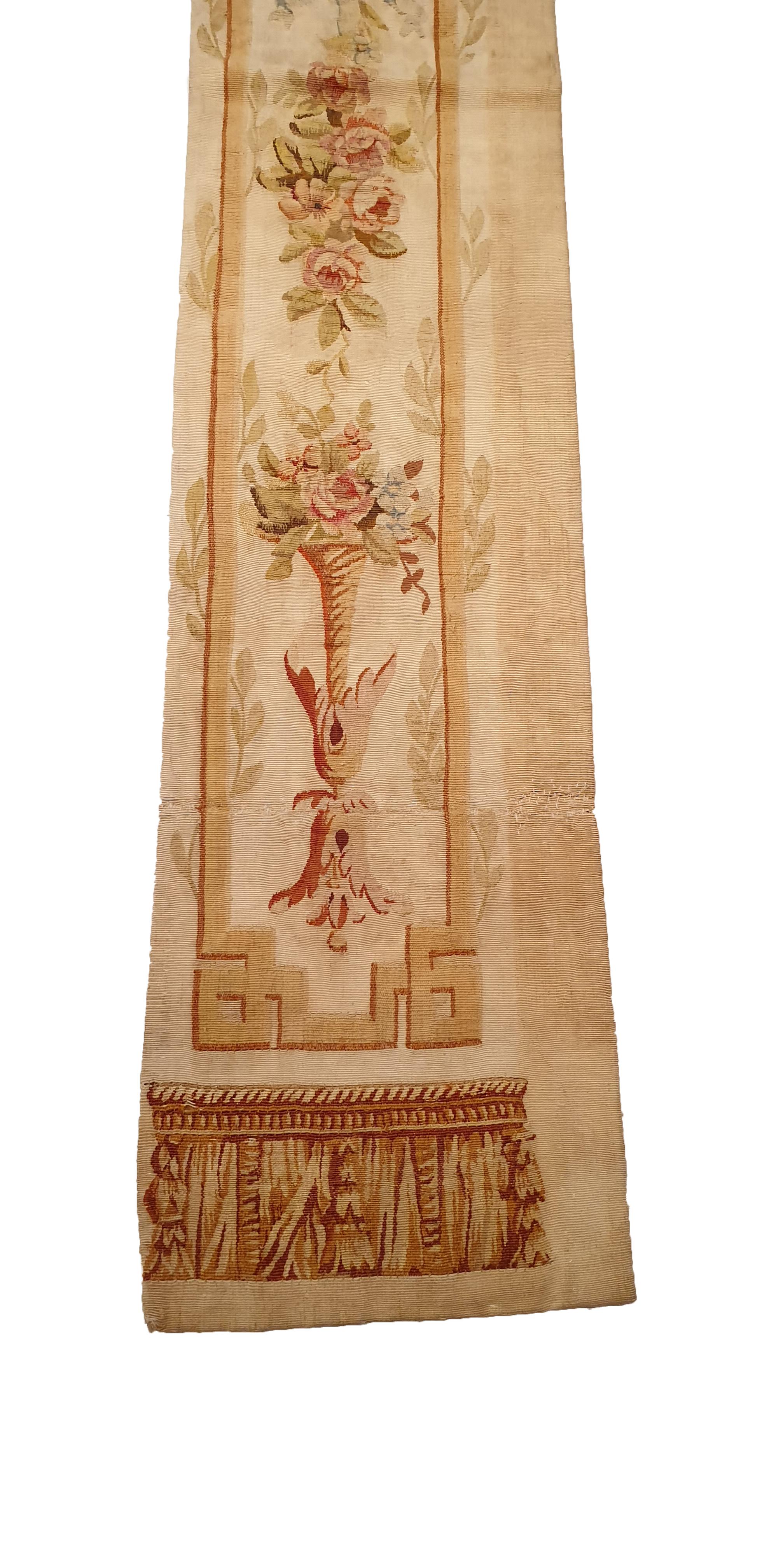 Brussels tapestry handwoven at the beginning of the 19th century. Whether it is a door trick, a play or simple decoration, this flowery work has 200 years of history to tell. 
Reinforcement by a fabric on the back of the work. 
Perfect state of