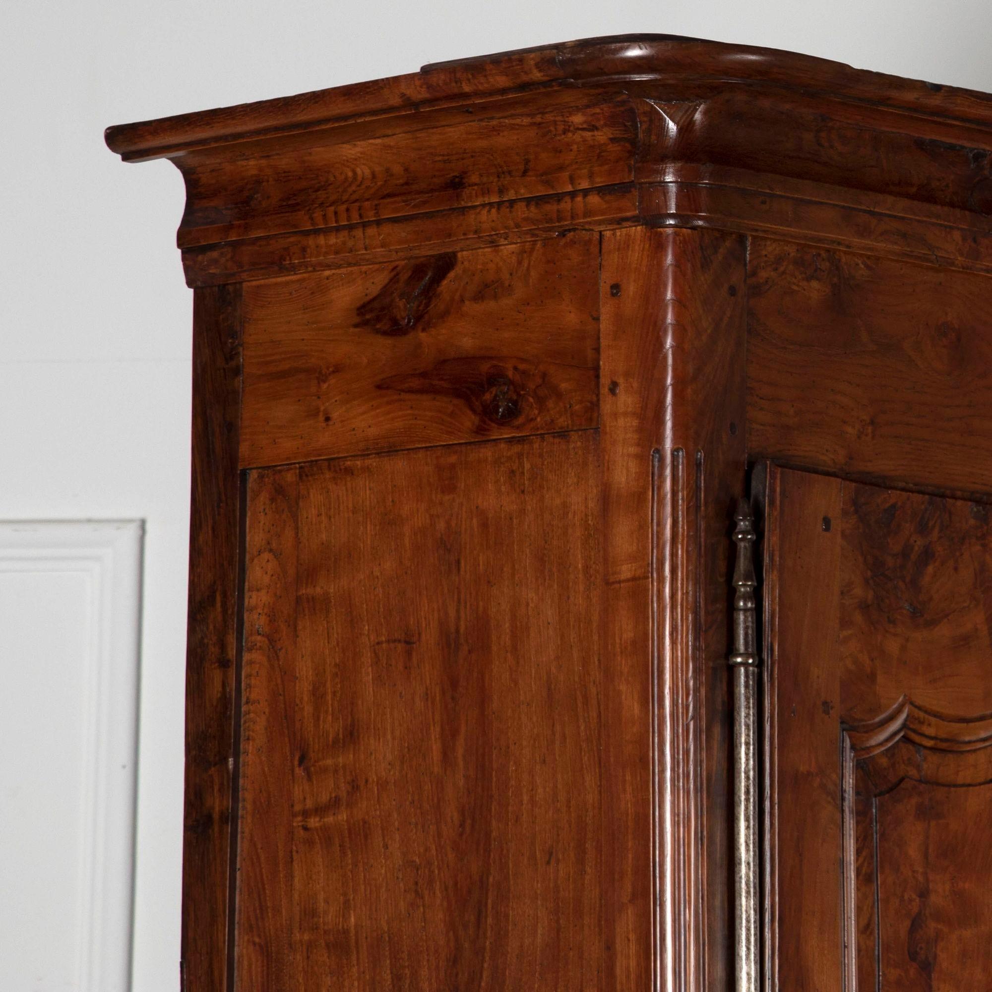 Fine example of a very useful cupboard.
This 19th Century buffet deux corps has the most wonderful colour coming from this rare burr elm.
Featuring some Fine detail carving this cupboard has been cleaned, waxed and has keys.