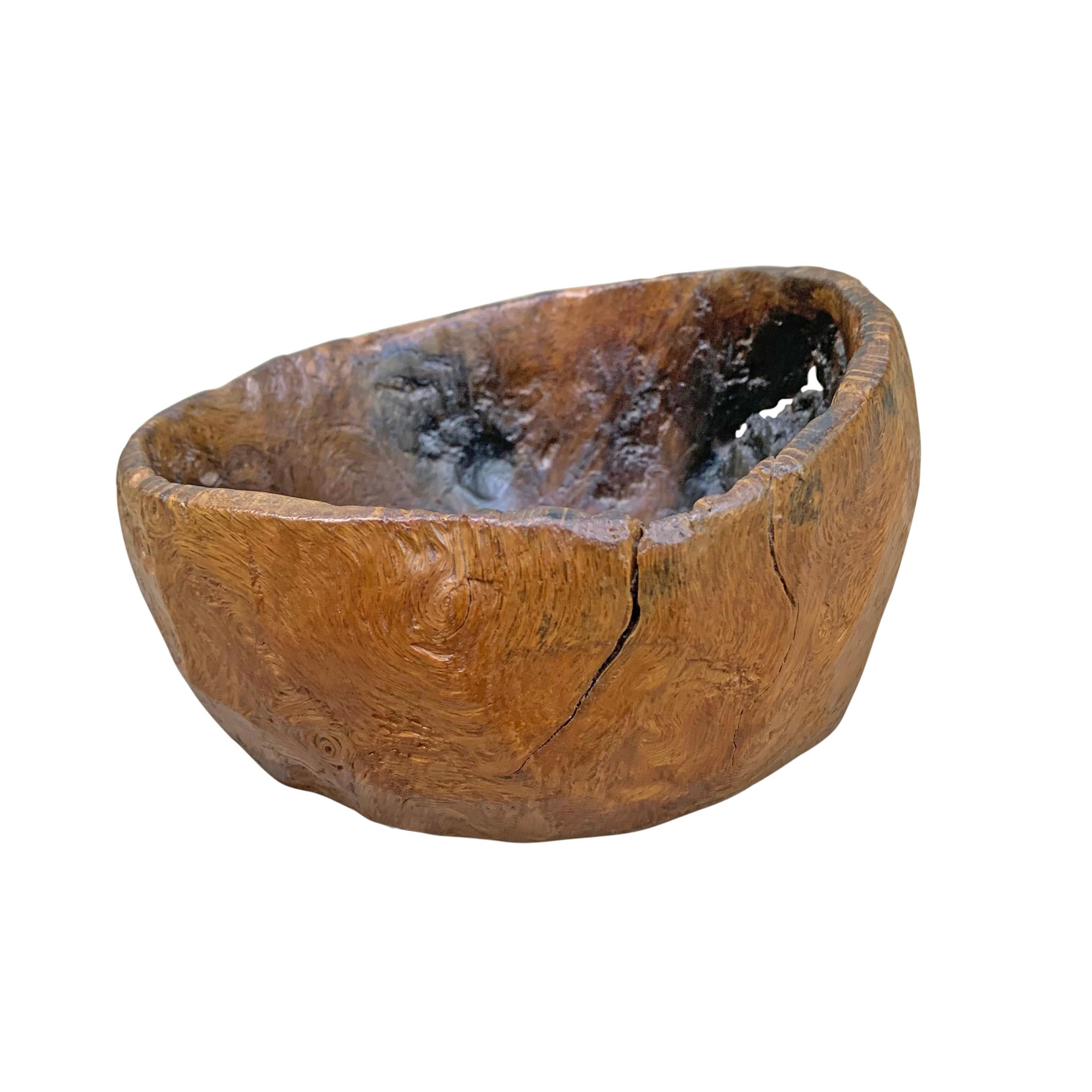 A beautiful 19th century American hand carved burl wood bowl with a fantastic swirling wood grain pattern and wonderful patina. Perfect on its own, or filled with snacks at your next party.