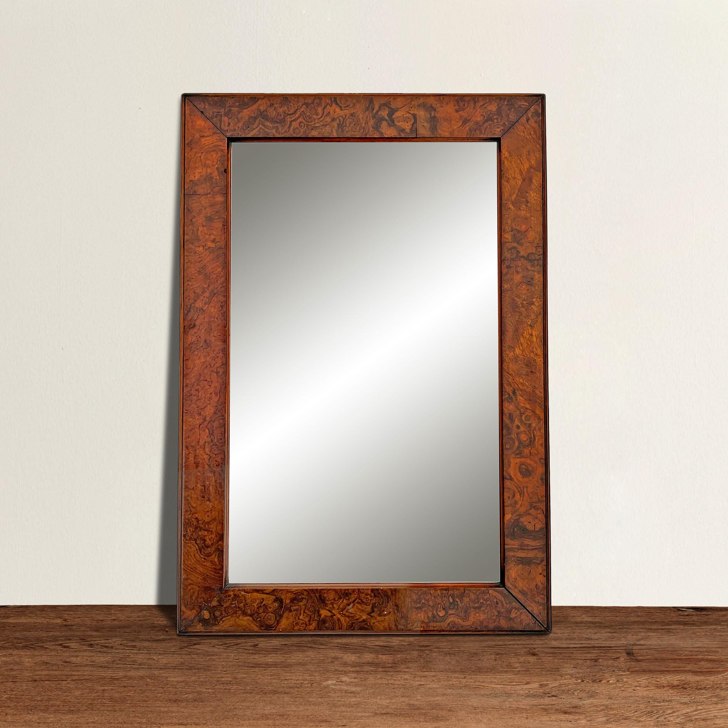 A wonderful 19th century American burl wood framed mirror with a fantastic rich active woodgrain pattern. Can be hung vertically or horizontally.