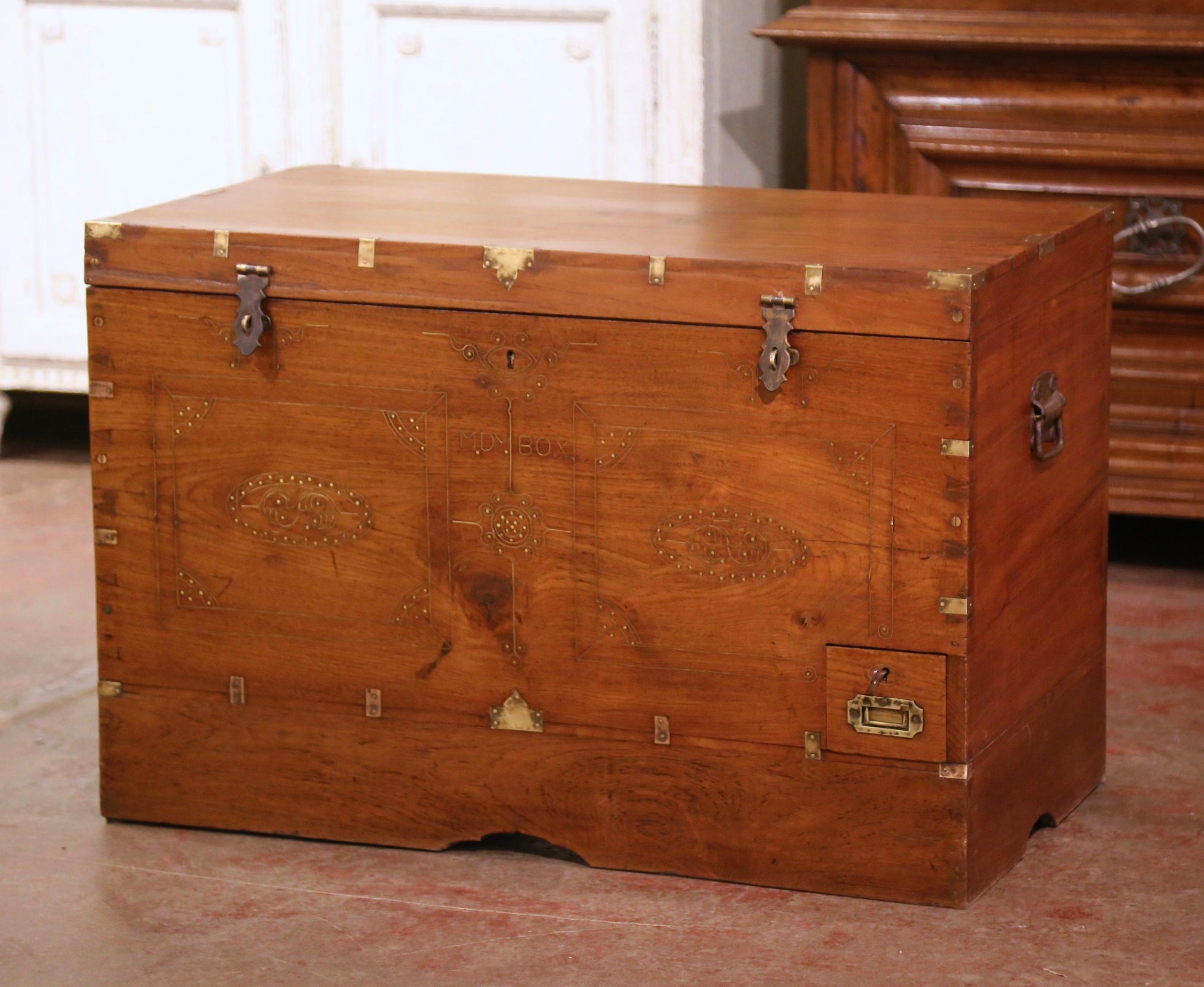 This is a very rare antique Victorian colonial teak Mandalay campaign box, possibly used by an officer or government official in the British Raj or military in Burma while on campaign, circa 1860. Made of chestnut, the piece is simply finished on