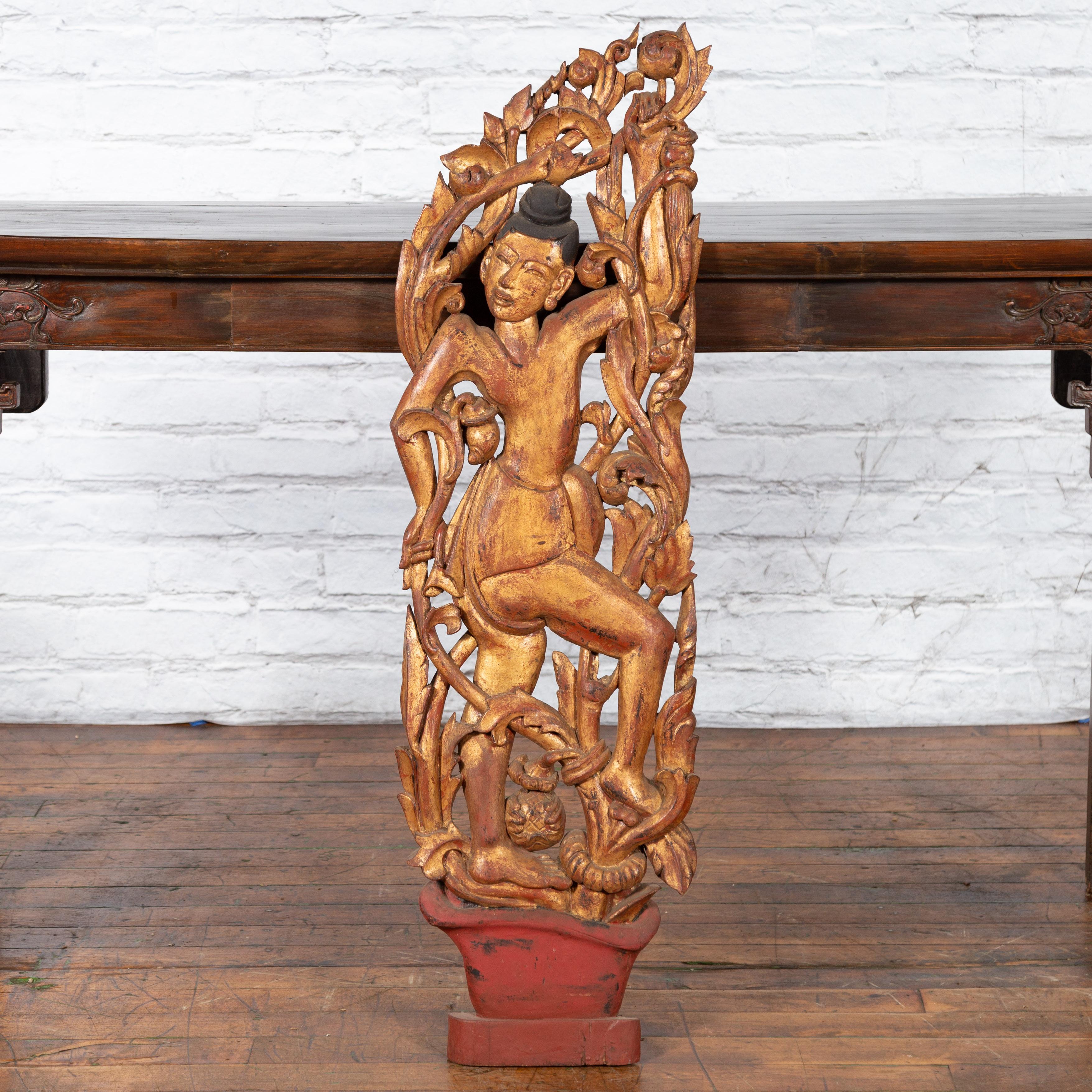 Hand-Carved 19th Century Burmese Carved Giltwood Fragment Depicting a Dancer with Foliage For Sale