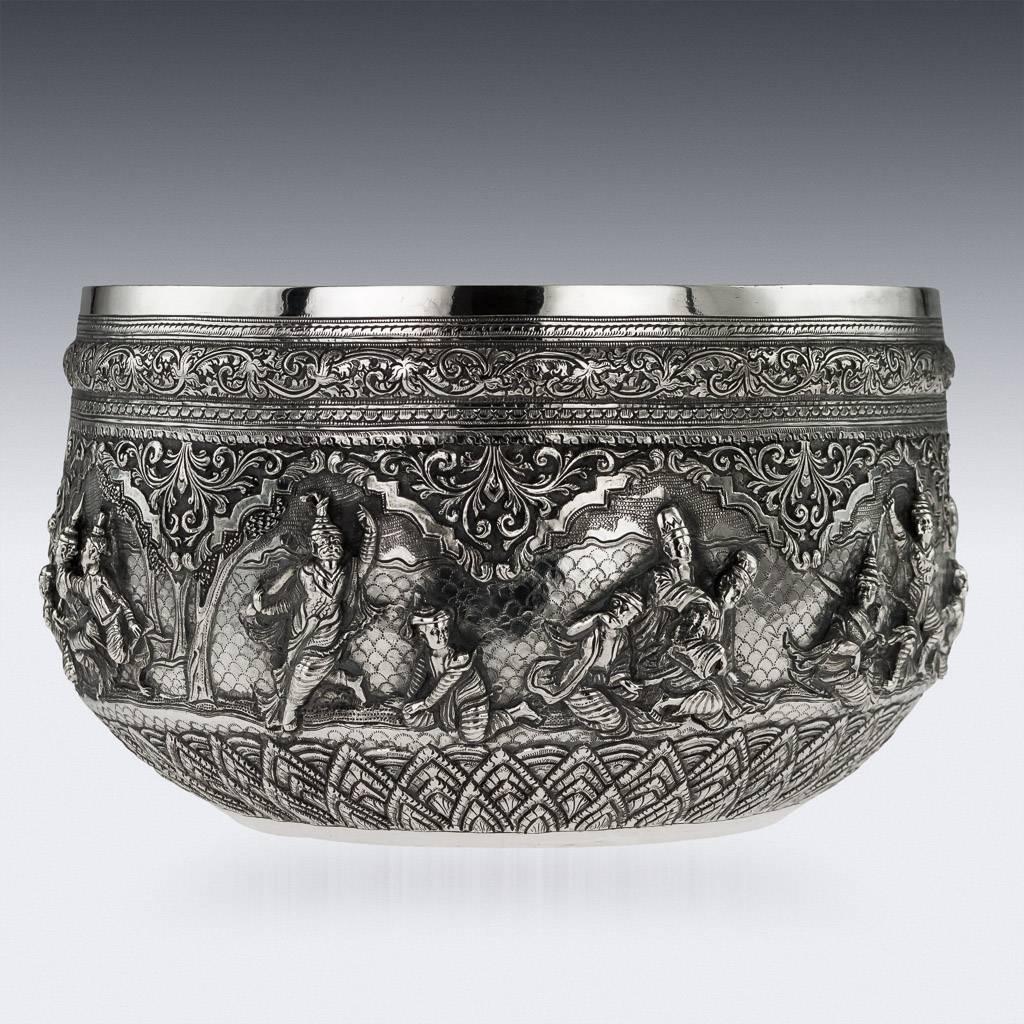 Antique 19th century exceptionally rare Burmese, Myanmar solid silver bowl, repousse' decorated in high relief depicting different traditional scenes from the Burmese mythology, showing detailed figures set against a chiseled matted background in