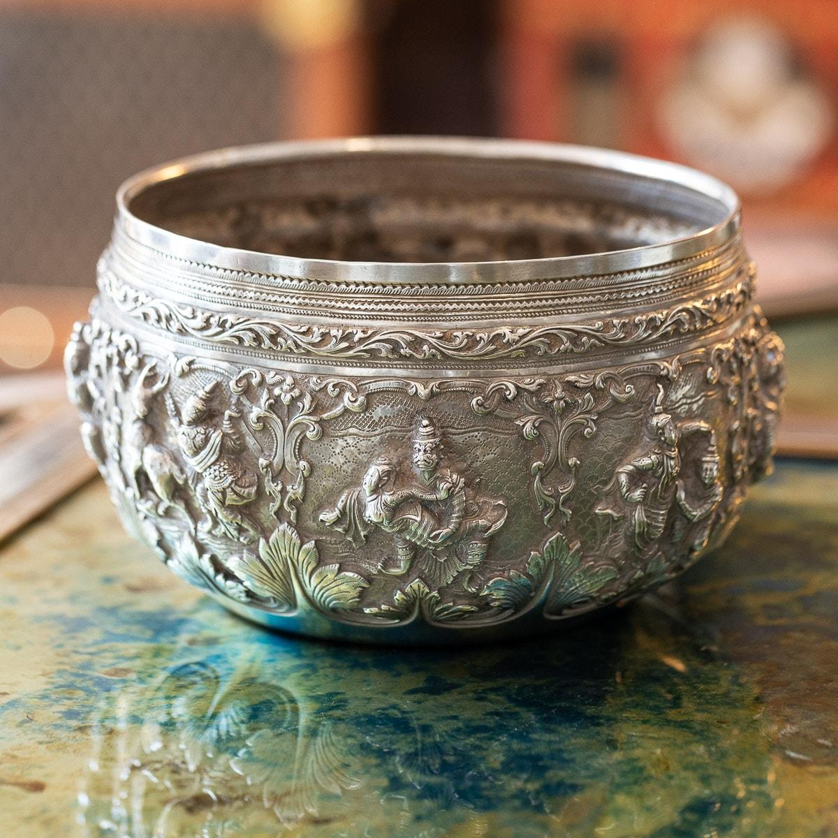 Antique 19th Century Exceptional Burmese, Myanmar Solid Silver Thabeik bowl, repousse' decorated in high relief depicting different traditional scenes from the Burmese mythology, showing large detailed figures set against a chiseled matted