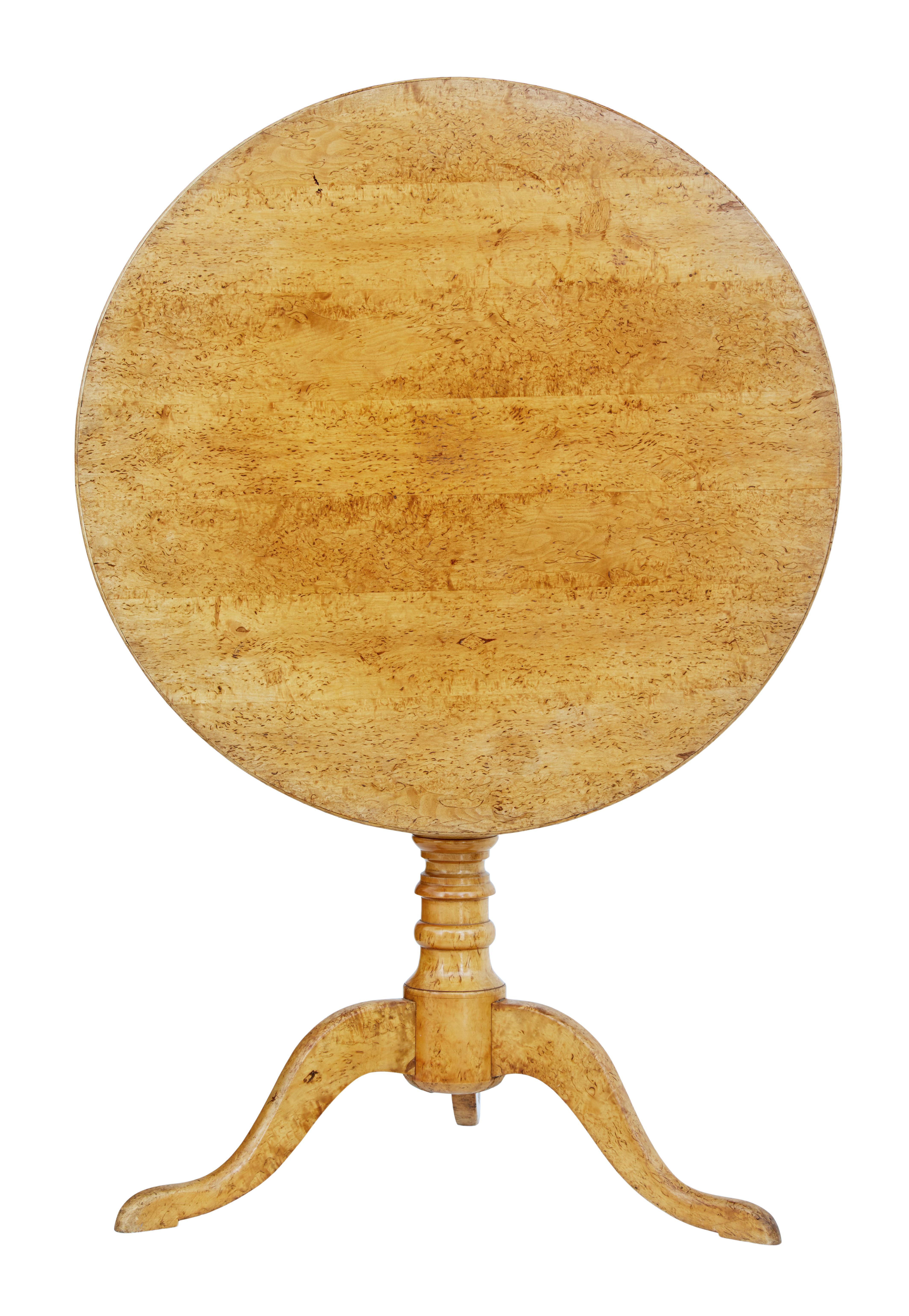 Beautiful round tilt-top table, circa 1870.

Stunning burr birch veneered round top, which tilts for easier storage when not in use. Top held in place by wooden peg.

Standing on a solid turned stem and tripod feet of the same burr