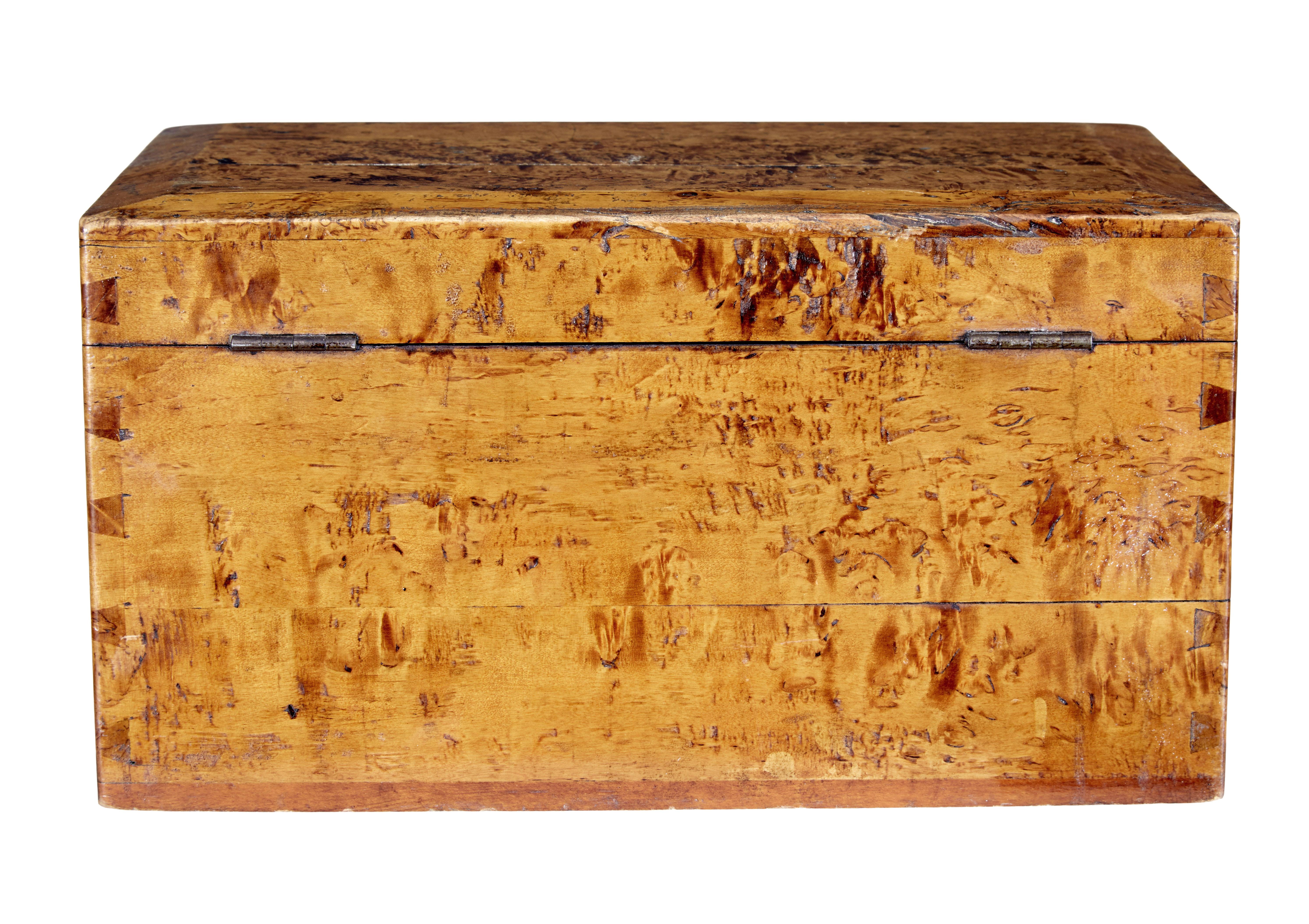 19th century burr birch sugar box circa 1870.

Fine piece of history showing how sugar used to be processed.  Birch root box with a fitted interior of a hinged knife on block for cutting sugar. Sitting on board with holes to allow the sugar to fall