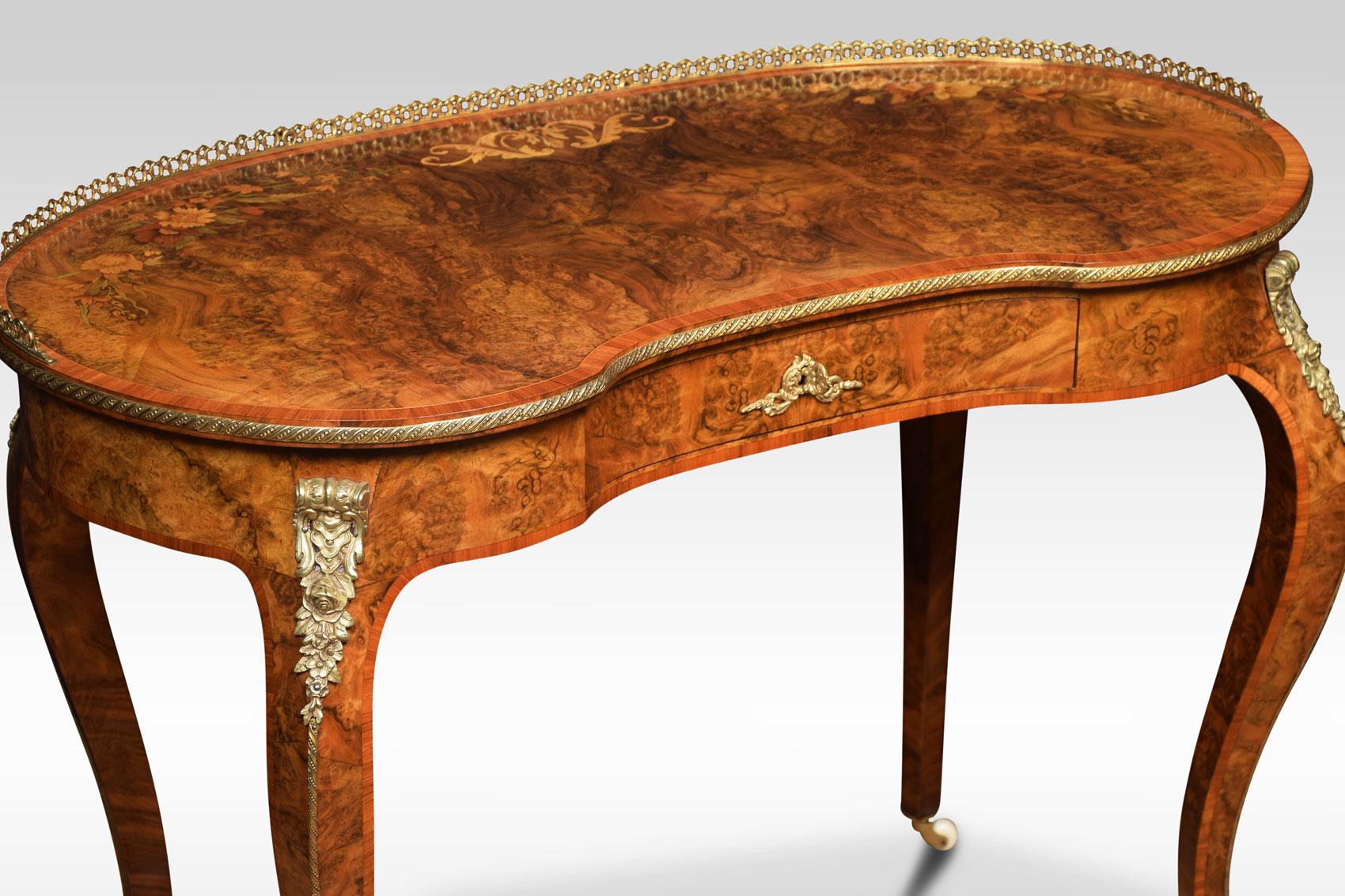 19th century burr walnut and marquetry kidney-shaped table the raised three quarter brass gallery to the kidney-shaped top having floral marquetry decoration enclosed by tulipwood banding. To the frieze fitted with central drawer all raised up on