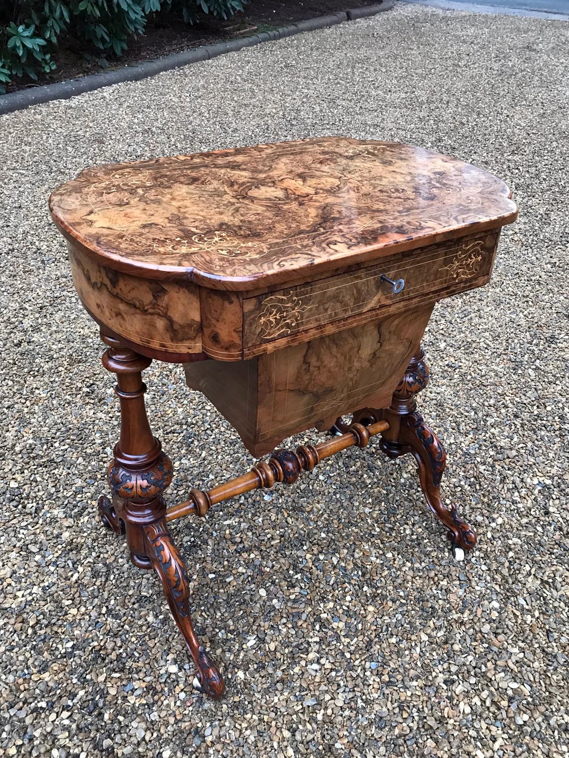 High quality 19th century burr walnut and marquetry work table with a central drawer with fitted compartments, a pull out box section below, turned / carved legs and stretchers,
circa 1860
Dimensions:
Width 26 inches – 66 cms
Depth 17 inches –