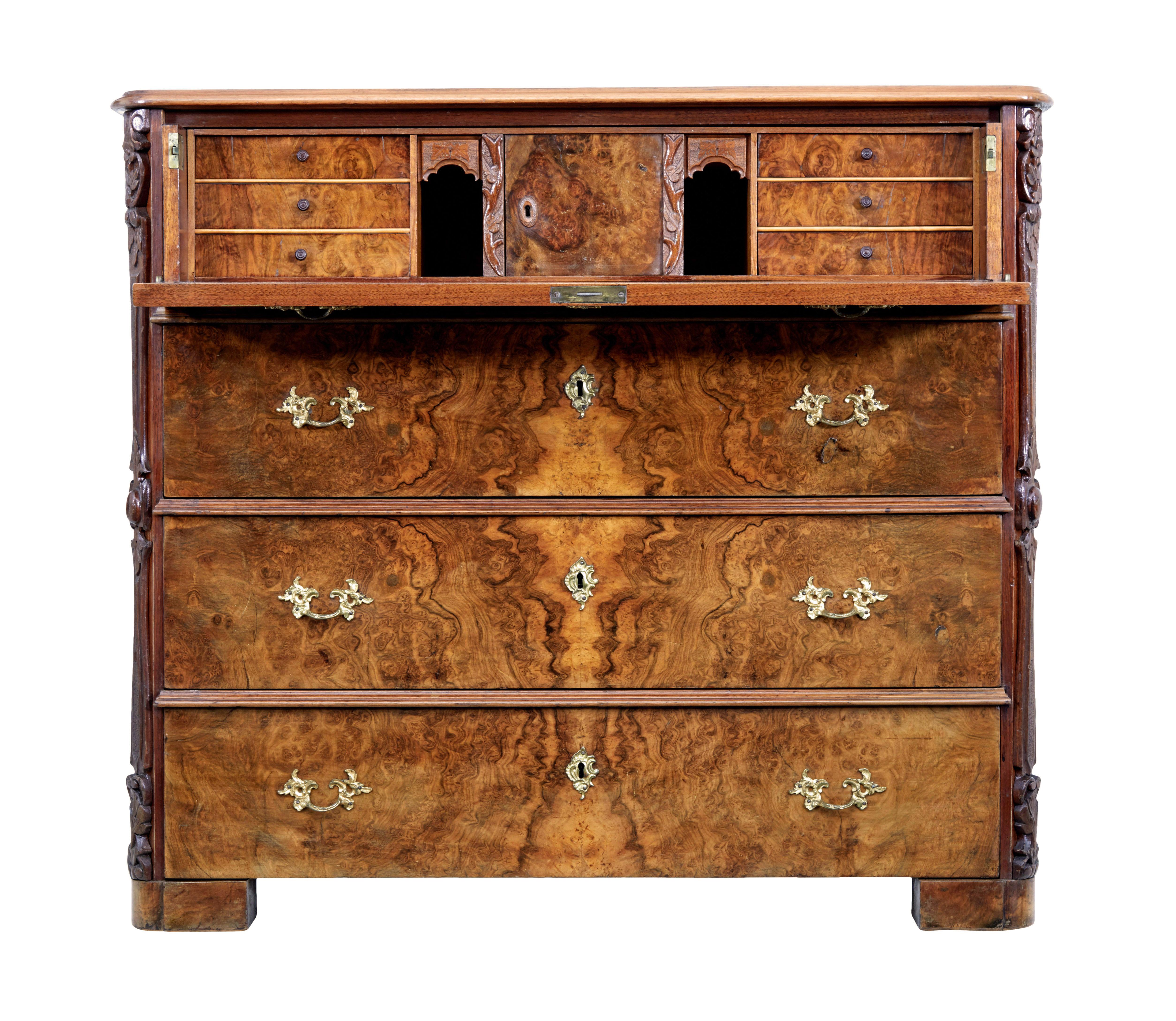 19th century burr walnut Secretaire chest of drawers circa 1870.

Good quality 4 drawer chest of the drawers, with the top drawer pulling out to become a fitted secretaire writing surface.

4 equal drawer fronts, veneered in matched burr walnut and