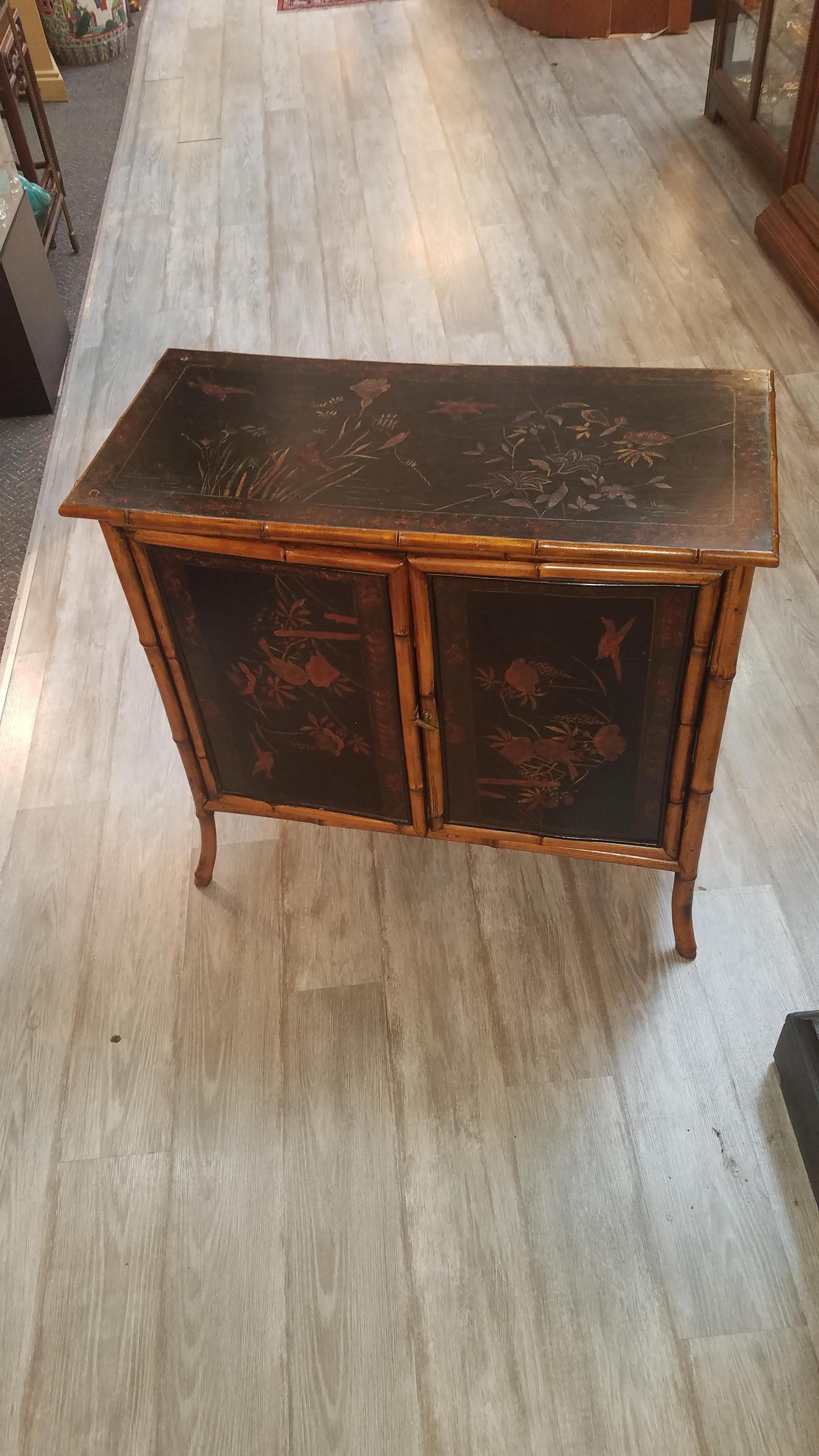 19th Century Burt Bamboo and Chinoiserie Lacquer Doored Cabinet In Good Condition In Lambertville, NJ