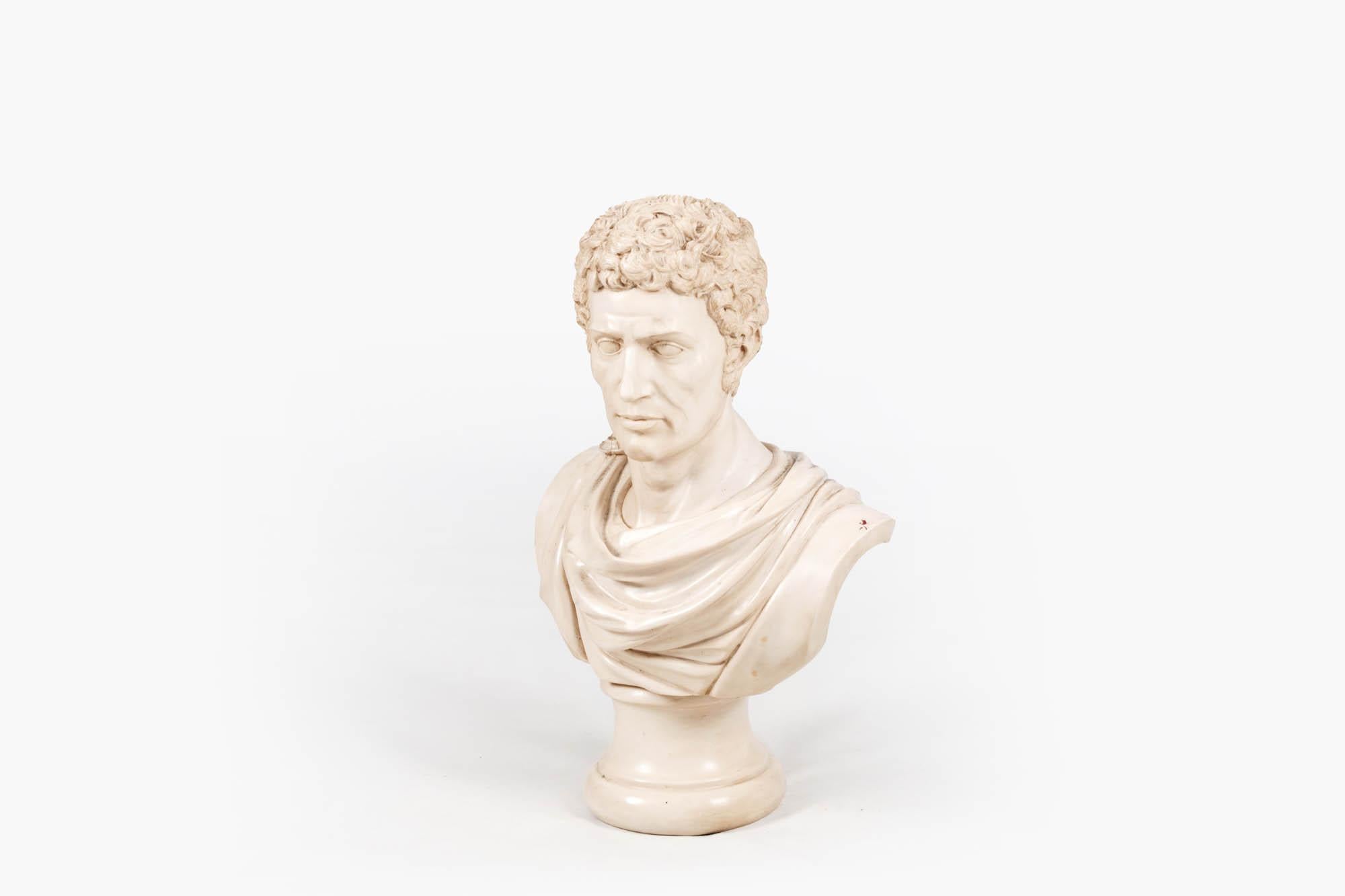19th Century resin bust, likely of a Roman nobleman, or possibly the famous general Lucius Junius Brutus who orchestrated a revolt to overthrow the last king of Rome and establish the Roman Republic in 509 BCE. He is depicted wearing a flowing toga