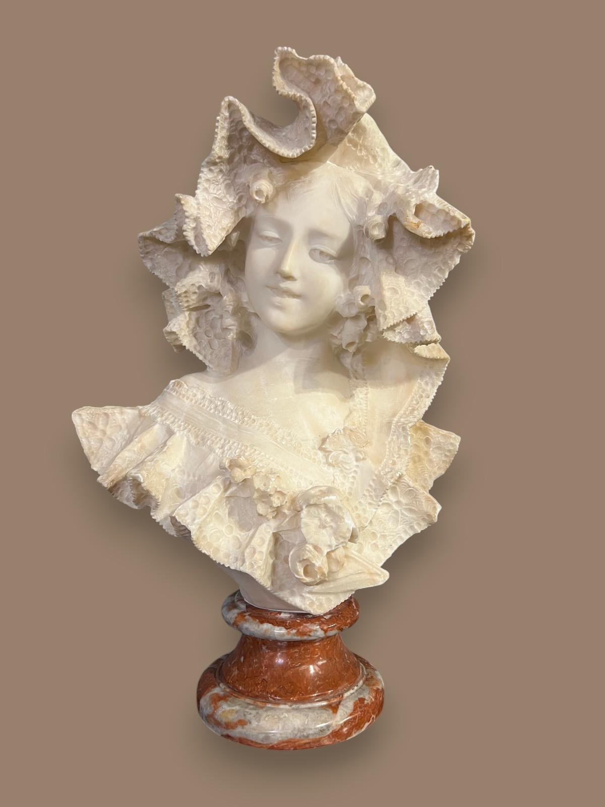 We present you with this exquisite large bust of a beautiful young lady with a large hat, carved in prestigious antique white statuary marble. A unique work of the highest quality and detail, rendering the subject's face, its clothes and especially