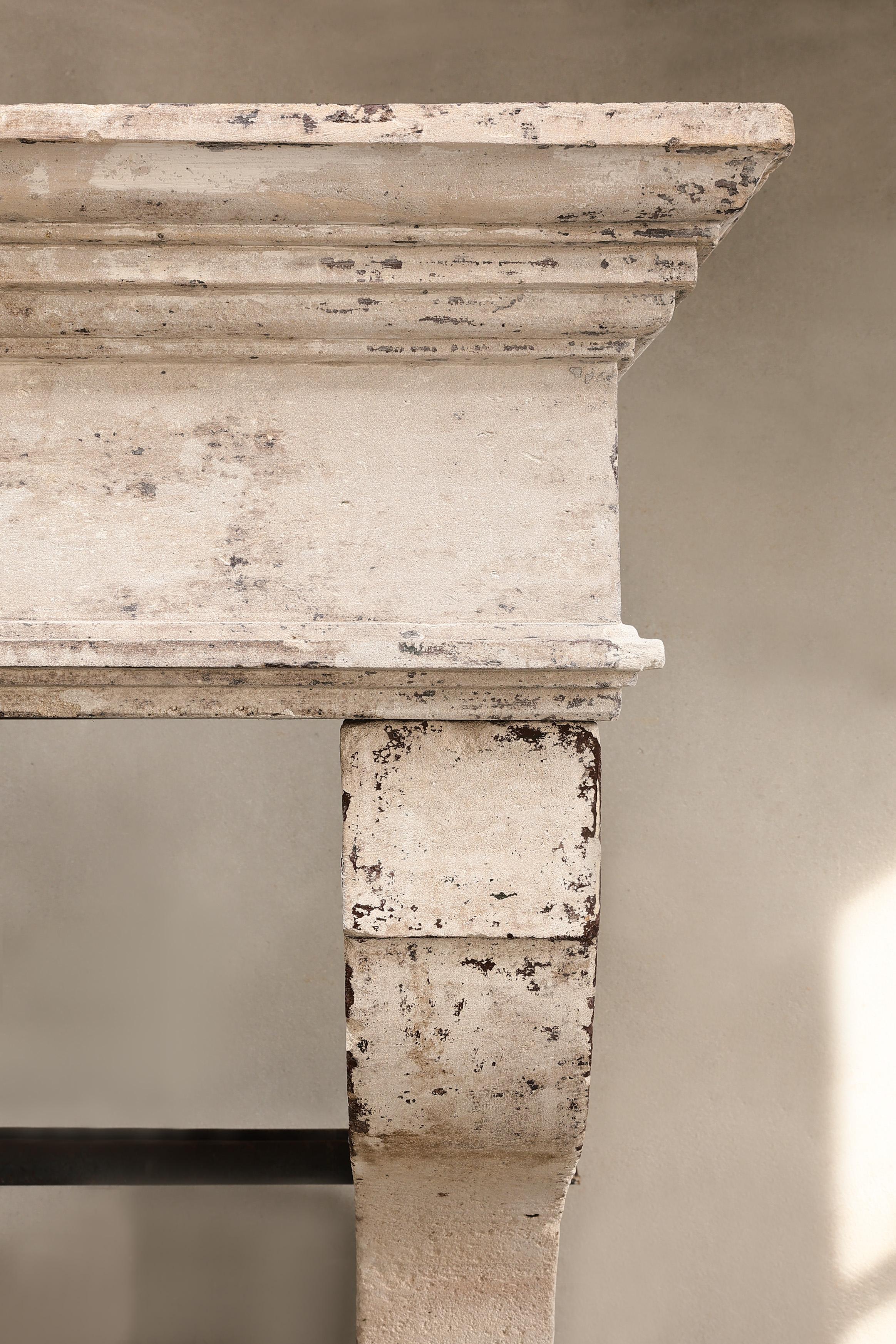 Limestone 19th century Campagnarde style antique fireplace of French limestone
