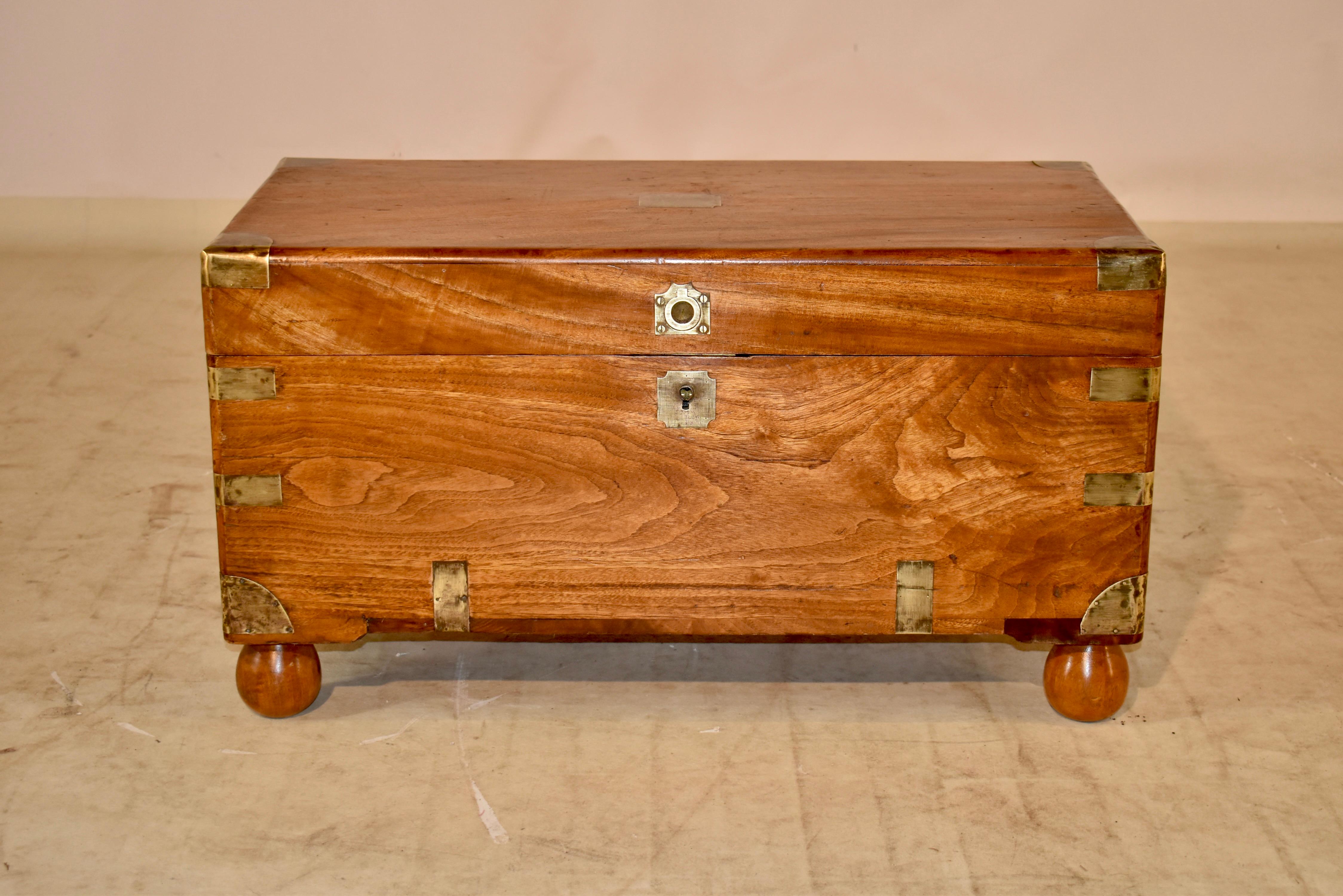 19th century British military campaign chest made from camphor wood. It retains the original brass hardware. These wooden chests were originally made to carry the belongings of military officers during campaigns in a wide variety of climates, as