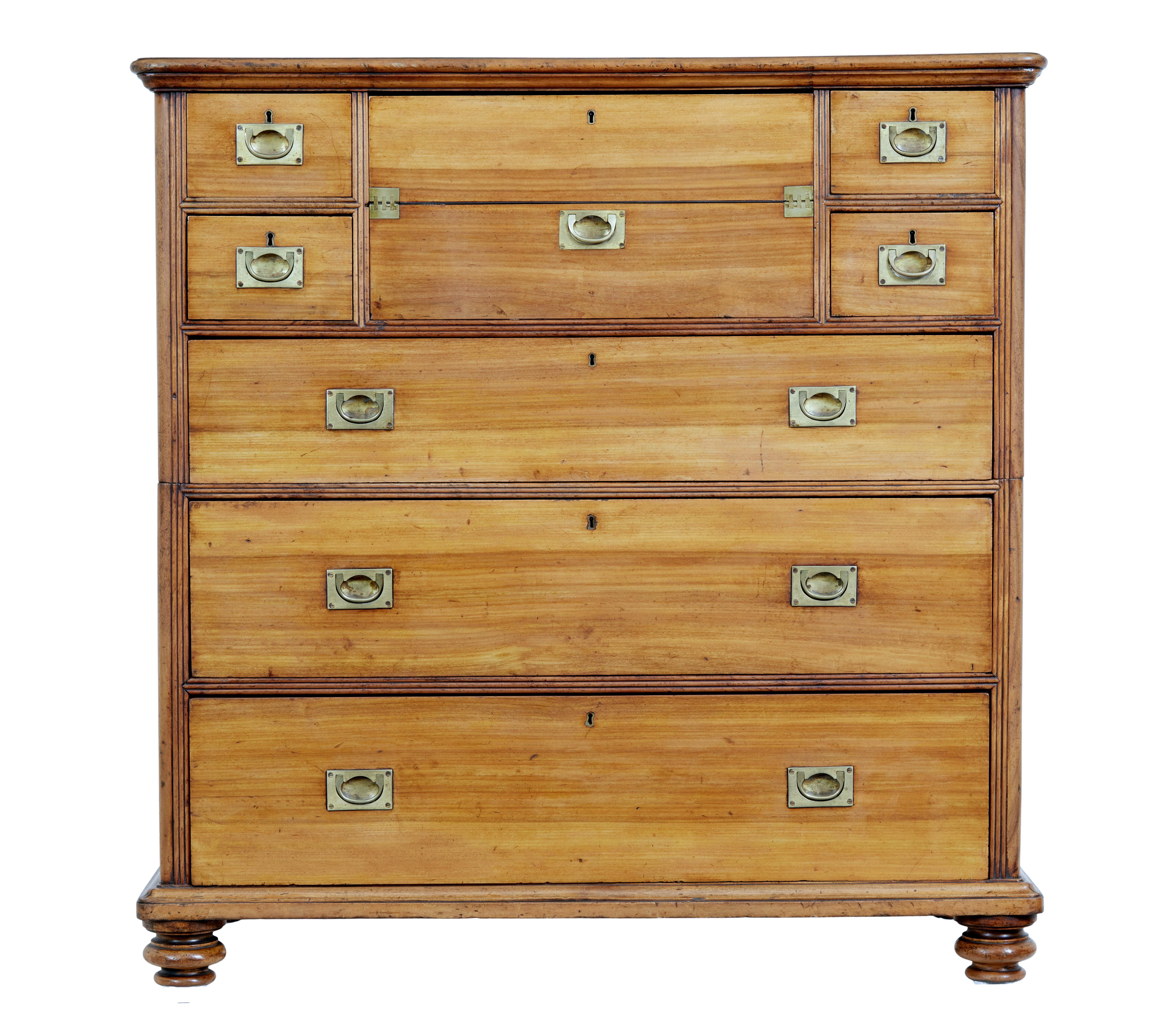 19th century camphor campaign military split chest of drawers desk circa 1850.

Fantastic coloured chest/desk in camphor wood. Splits in 2 halves, bottom section houses 2 large drawers, top section comprises of 1 large drawer and 4 small drawers