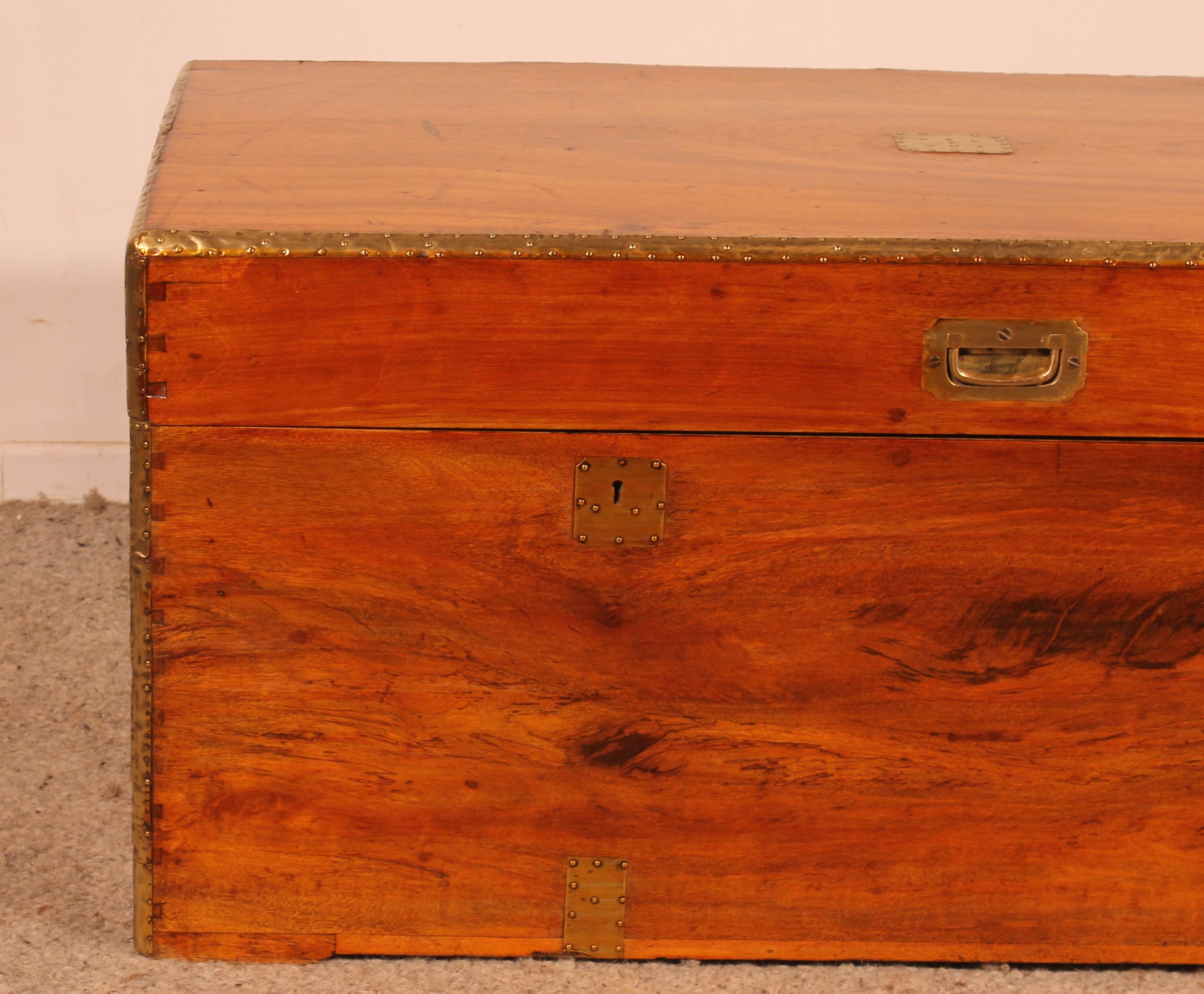 Elegant large 19th century marine or campaign chest in solid camphor with two locks
Camphor of very good quality with a very beautiful flame or all the faces are composed of a single camphor board

English navy chest with brass reinforcements