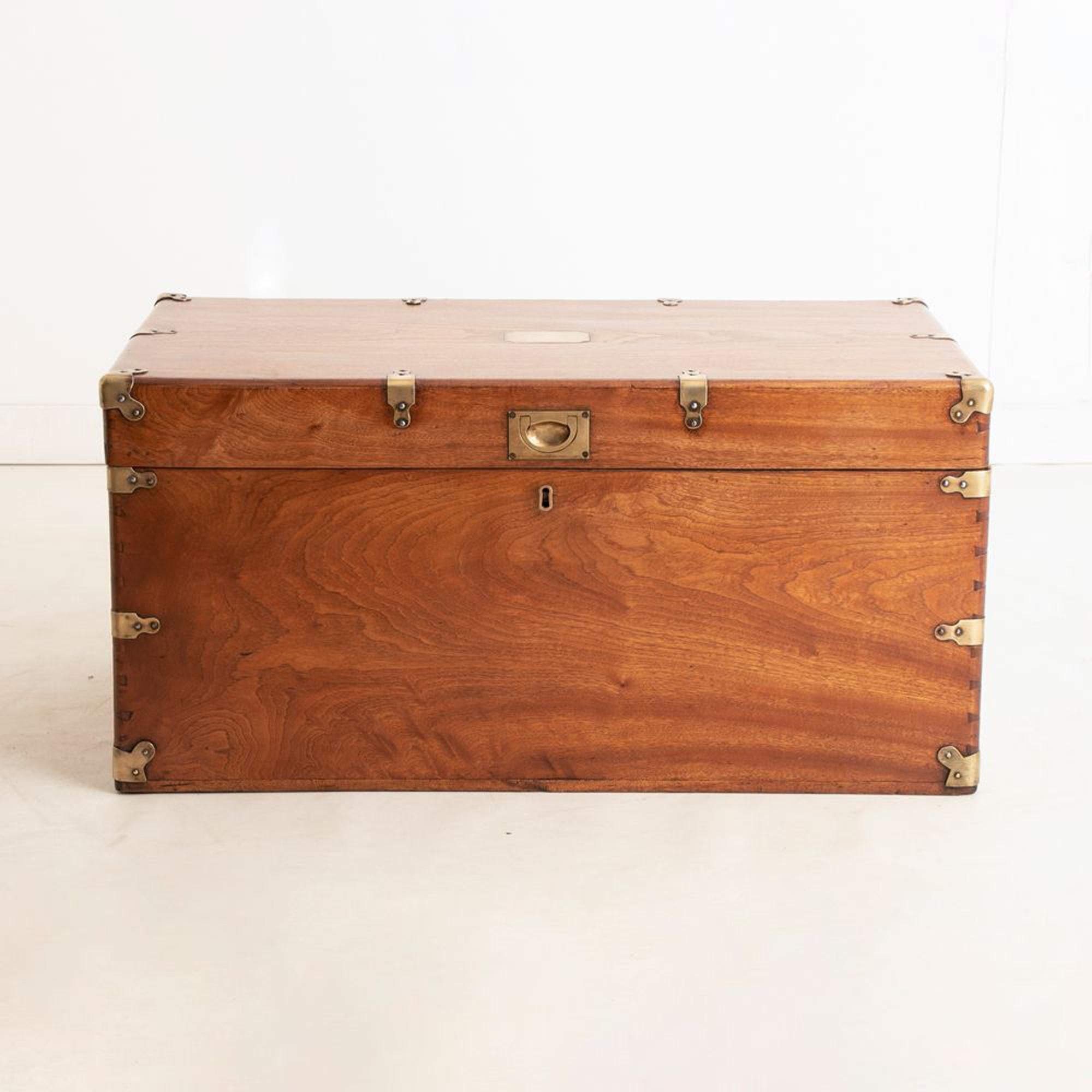 An antique military trunk made in camphorwood with brass hardware.

Professionally restored and bespoke polished with an original very clean interior and a wonderful camphor scent.