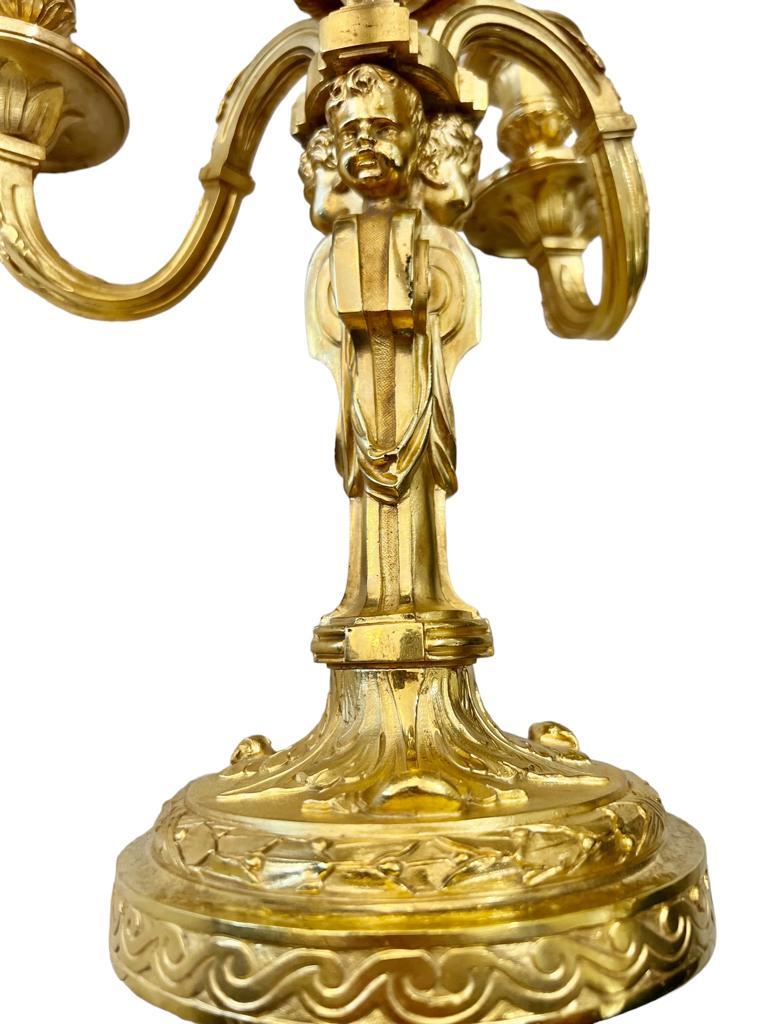 19th Century Candlesticks in Gilt Bronze with Three Lights and Putti Motifs In Good Condition In NICE, FR