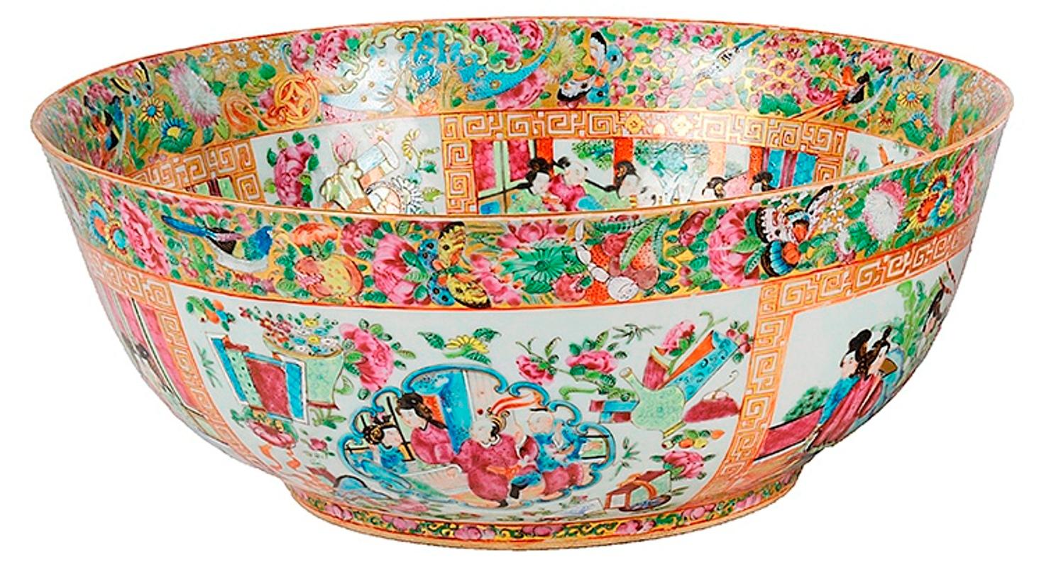 A very good quality late 19th century Chinese Canton / Rose medallion porcelain bowl, having wonderful bold colouring, with a green ground with gilded decoration, classical oriental scenes around the outside and within the centre. Measures: 37cm